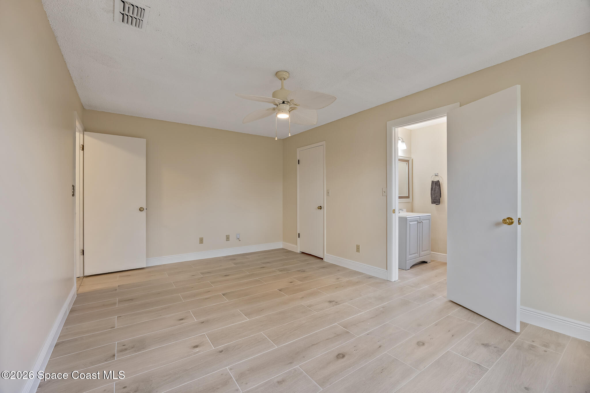 180 Concha Drive Sebastian, FL 32958 - Photo 21 of 32 wooden floor in an empty room