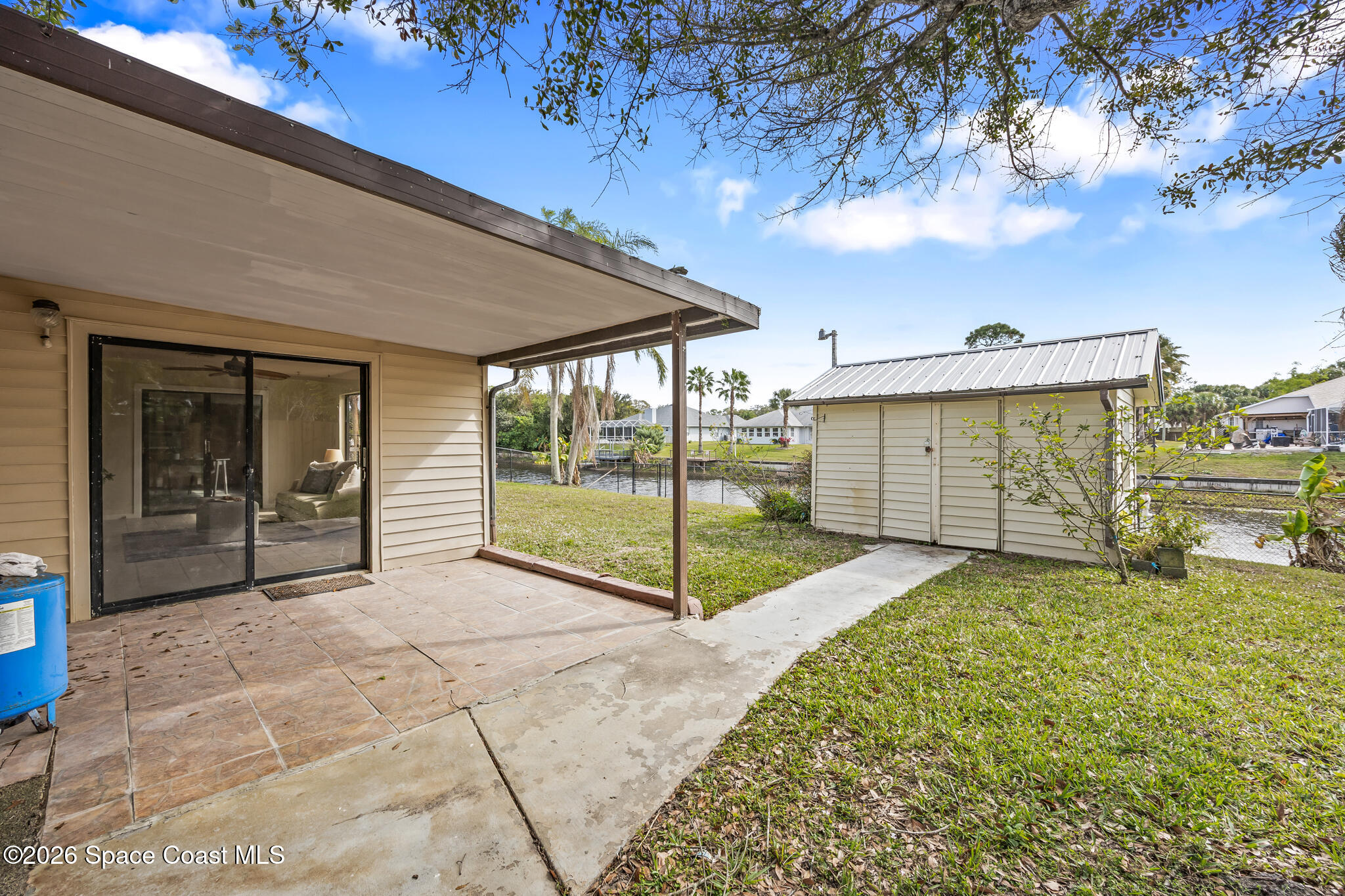 180 Concha Drive Sebastian, FL 32958 - Photo 27 of 32 a view of a backyard of the house