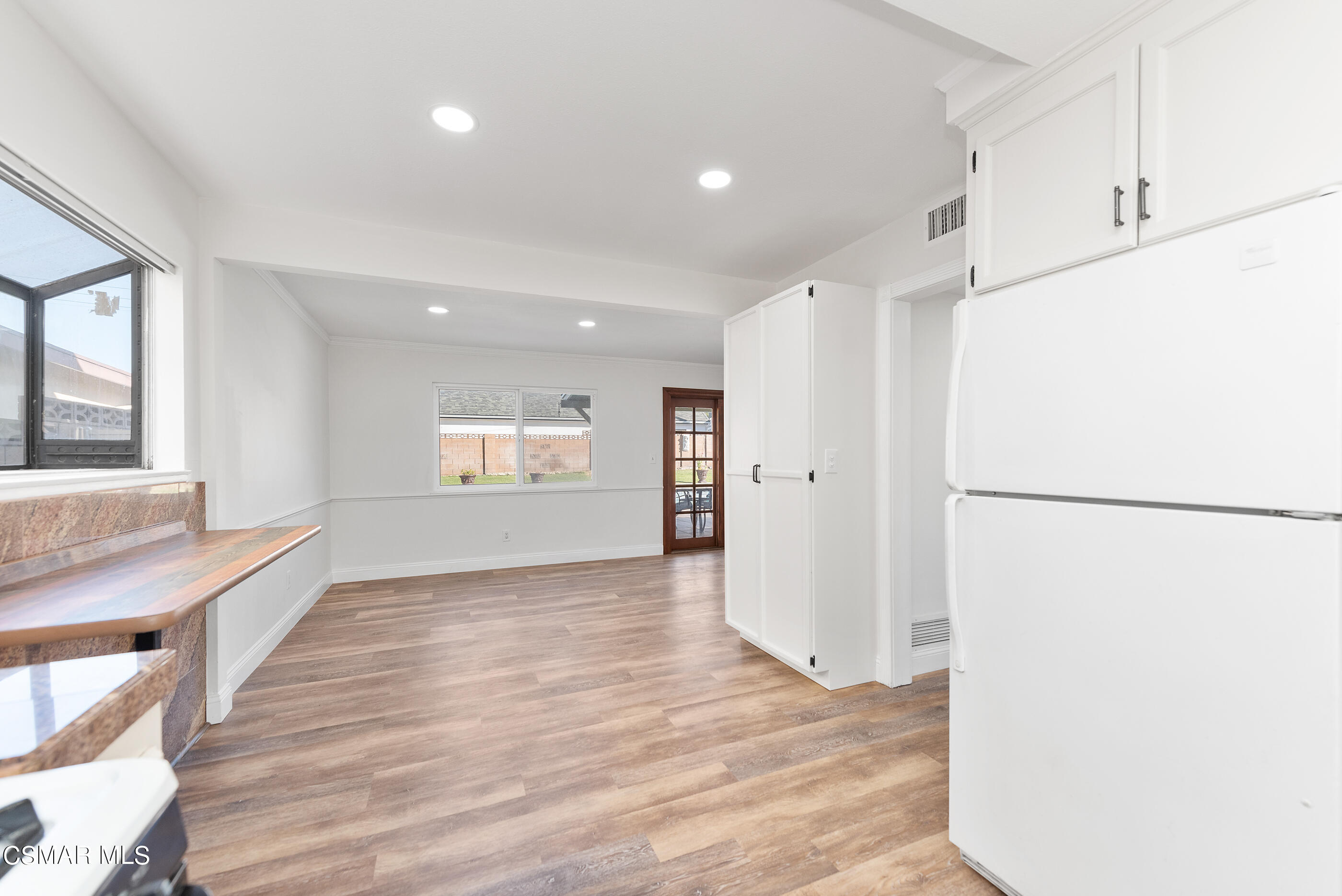 2181 Rhoda Street Simi Valley, CA 93065 - Photo 14 of 36 a view of an empty room with a kitchen