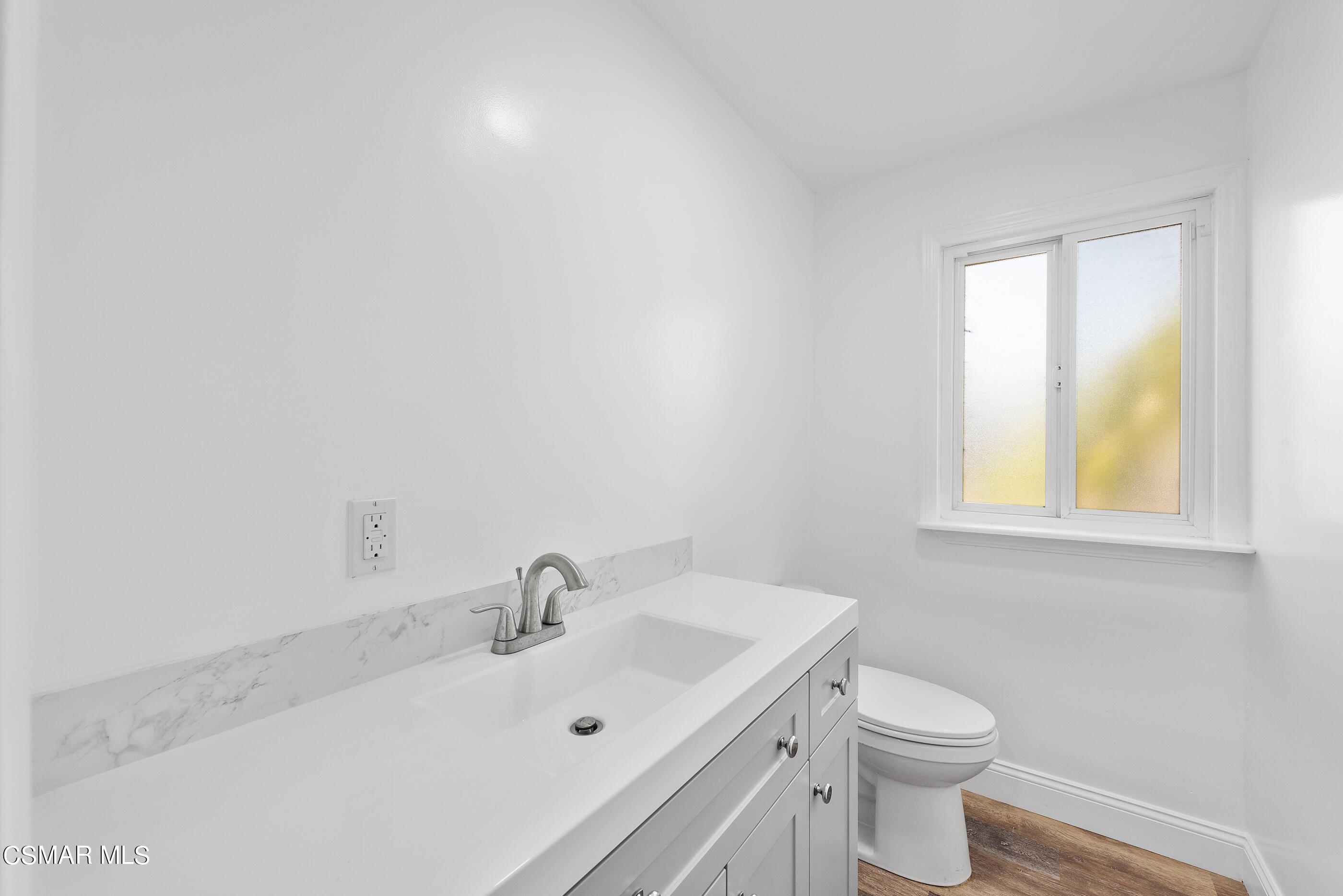 2181 Rhoda Street Simi Valley, CA 93065 - Photo 16 of 36 a bathroom with a sink and a toilet
