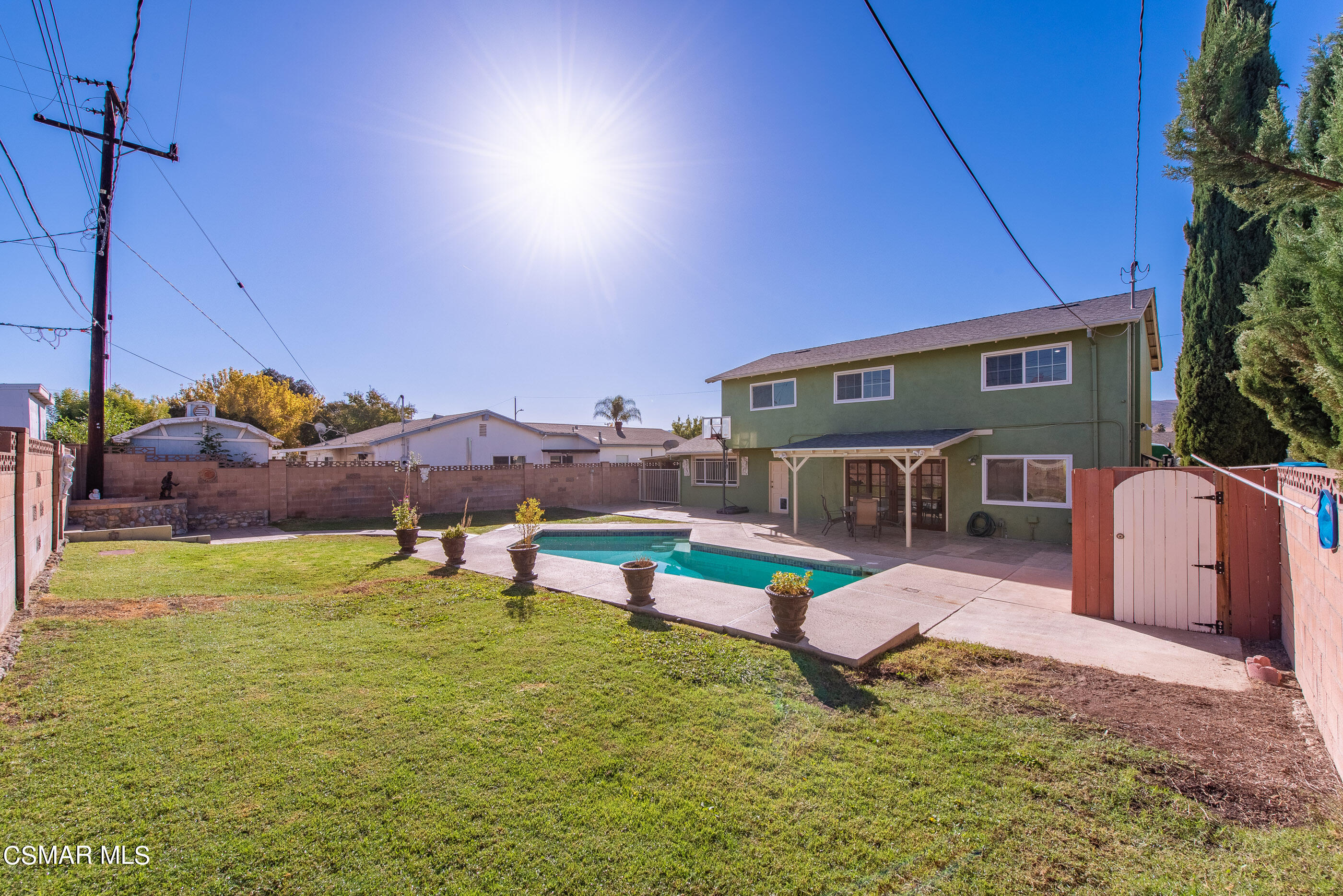 2181 Rhoda Street Simi Valley, CA 93065 - Photo 35 of 36 a swimming pool with outdoor seating and yard