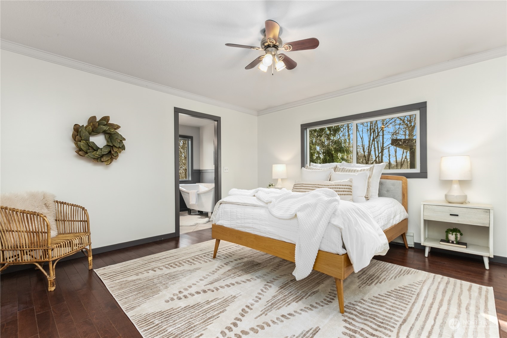 3193 Behme Road Custer, WA 98240 - Photo 13 of 33 a bedroom with a bed and a chandelier