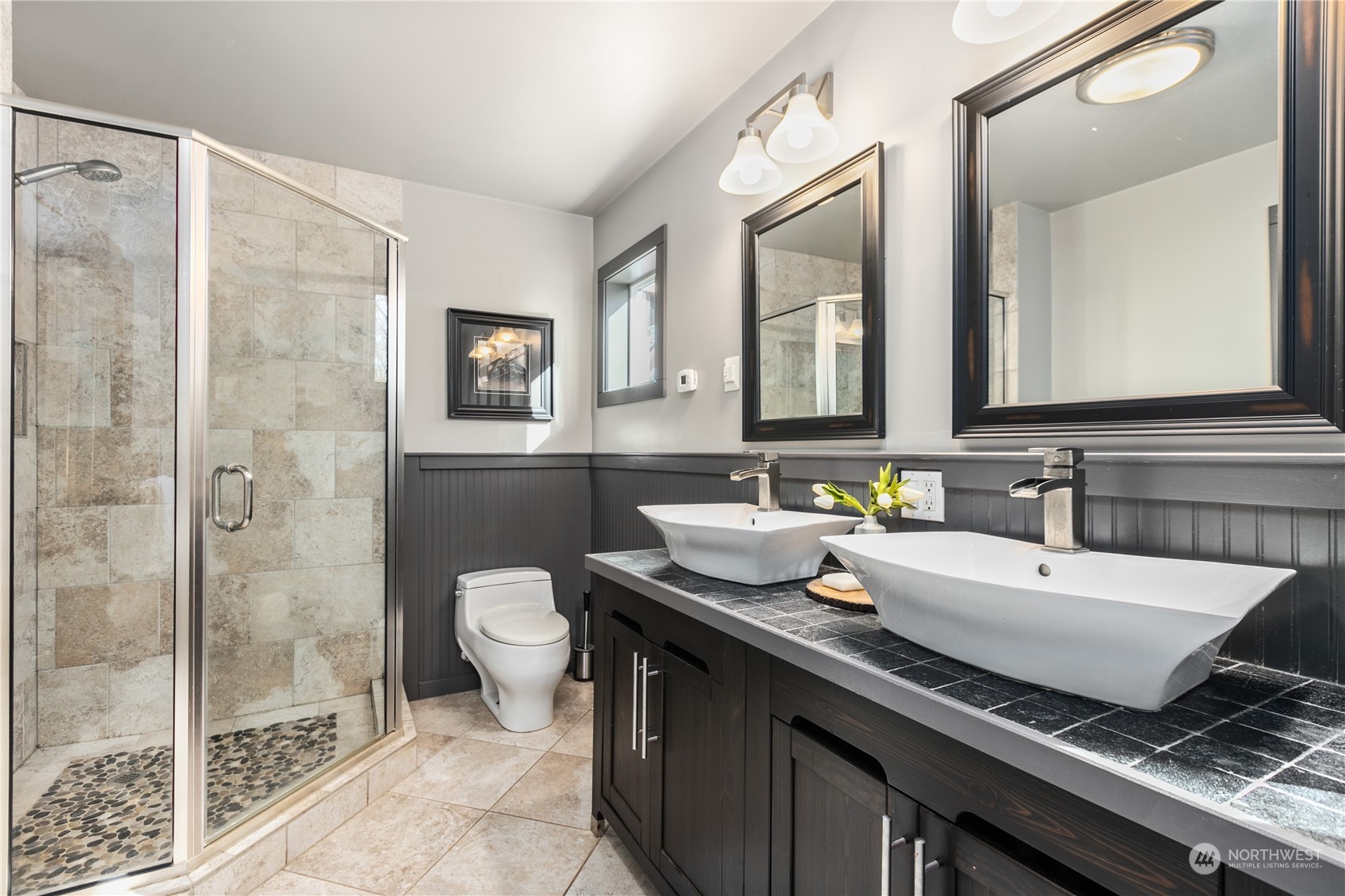 3193 Behme Road Custer, WA 98240 - Photo 14 of 33 a bathroom with a granite countertop sink a toilet a mirror and shower