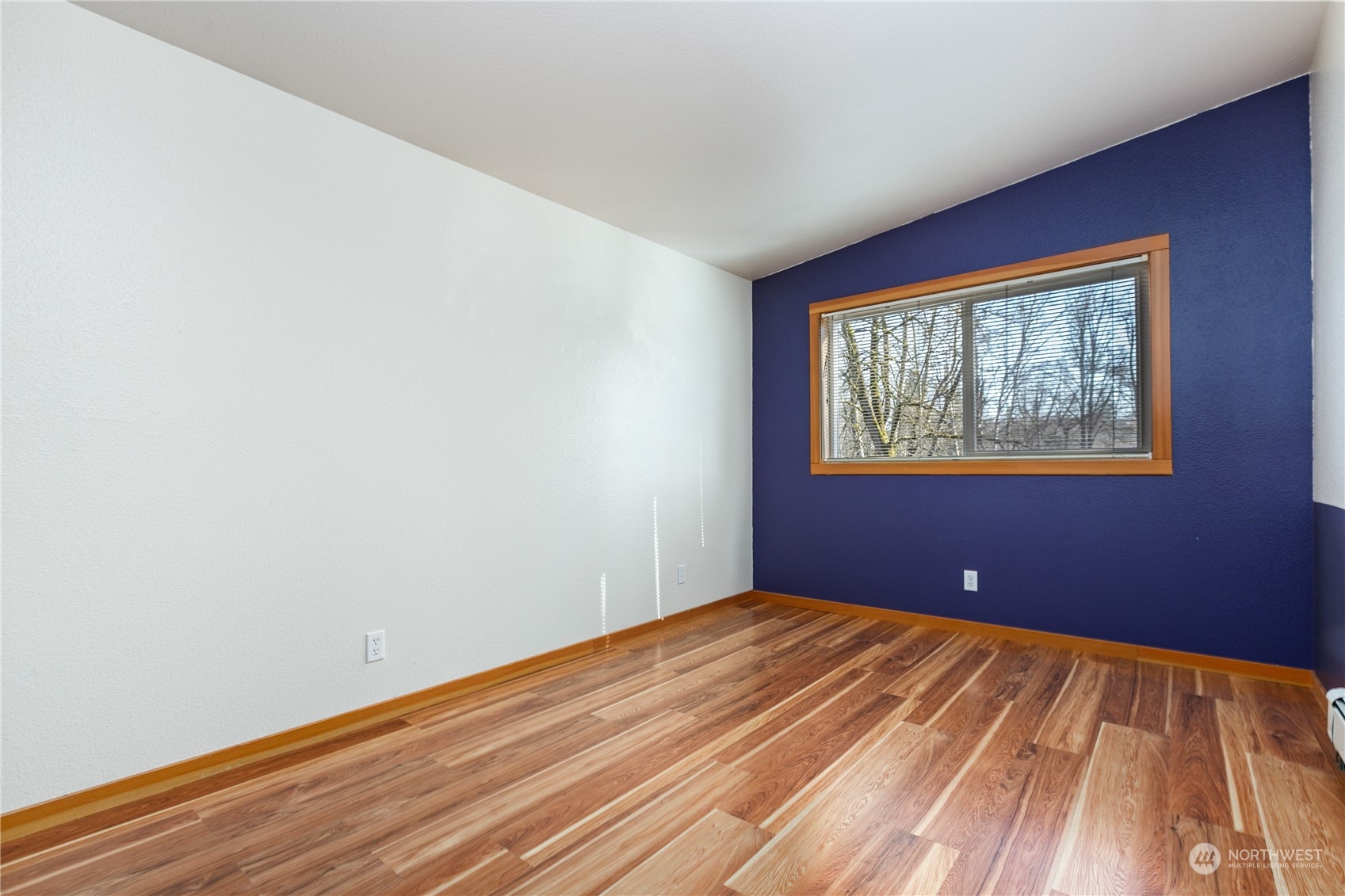3193 Behme Road Custer, WA 98240 - Photo 22 of 33 a view of a big room with wooden floor and windows