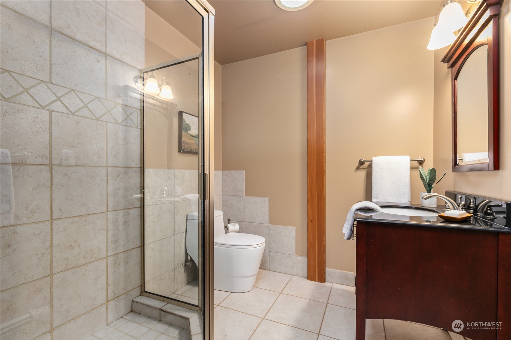 3193 Behme Road Custer, WA 98240 - Photo 24 of 33 a bathroom with a granite countertop sink toilet and shower