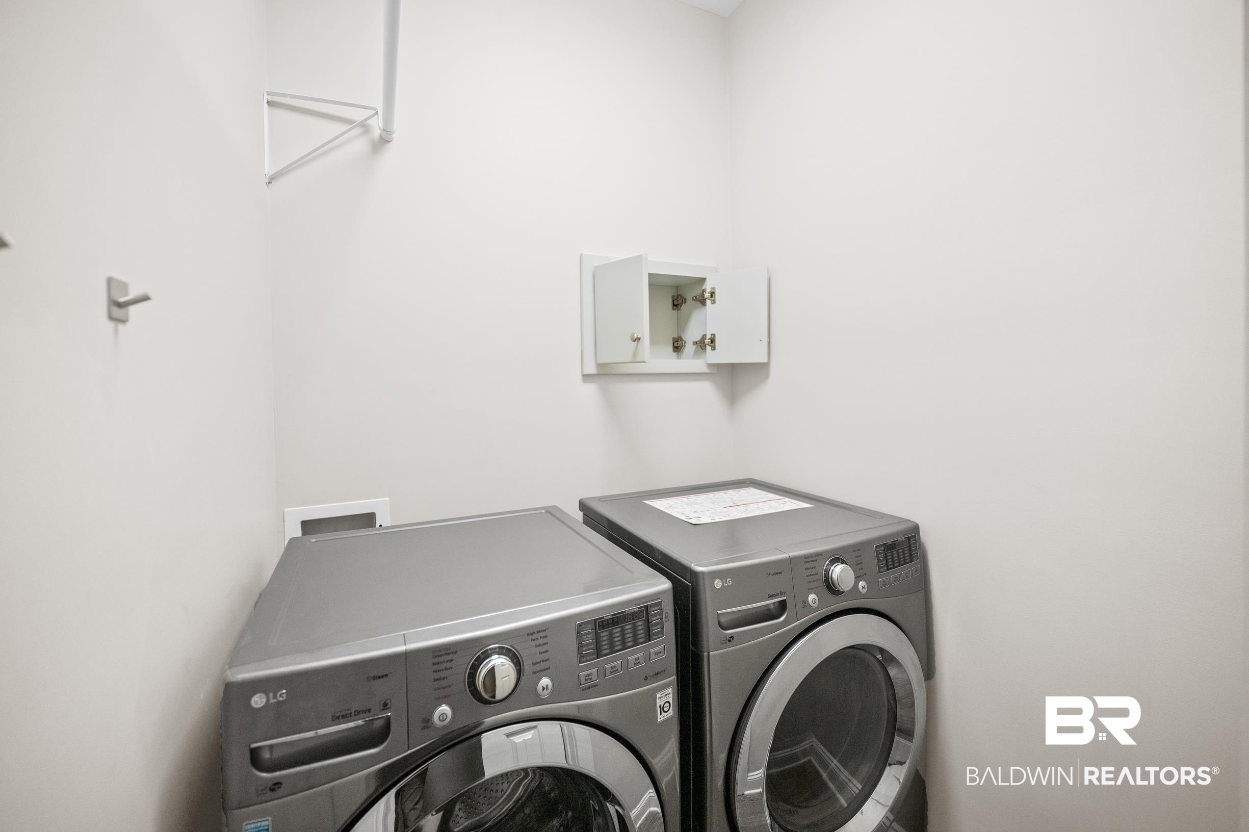12254 Reunion Place Foley, AL 36535 - Photo 38 of 62 Laundry room with washing machine and dryer