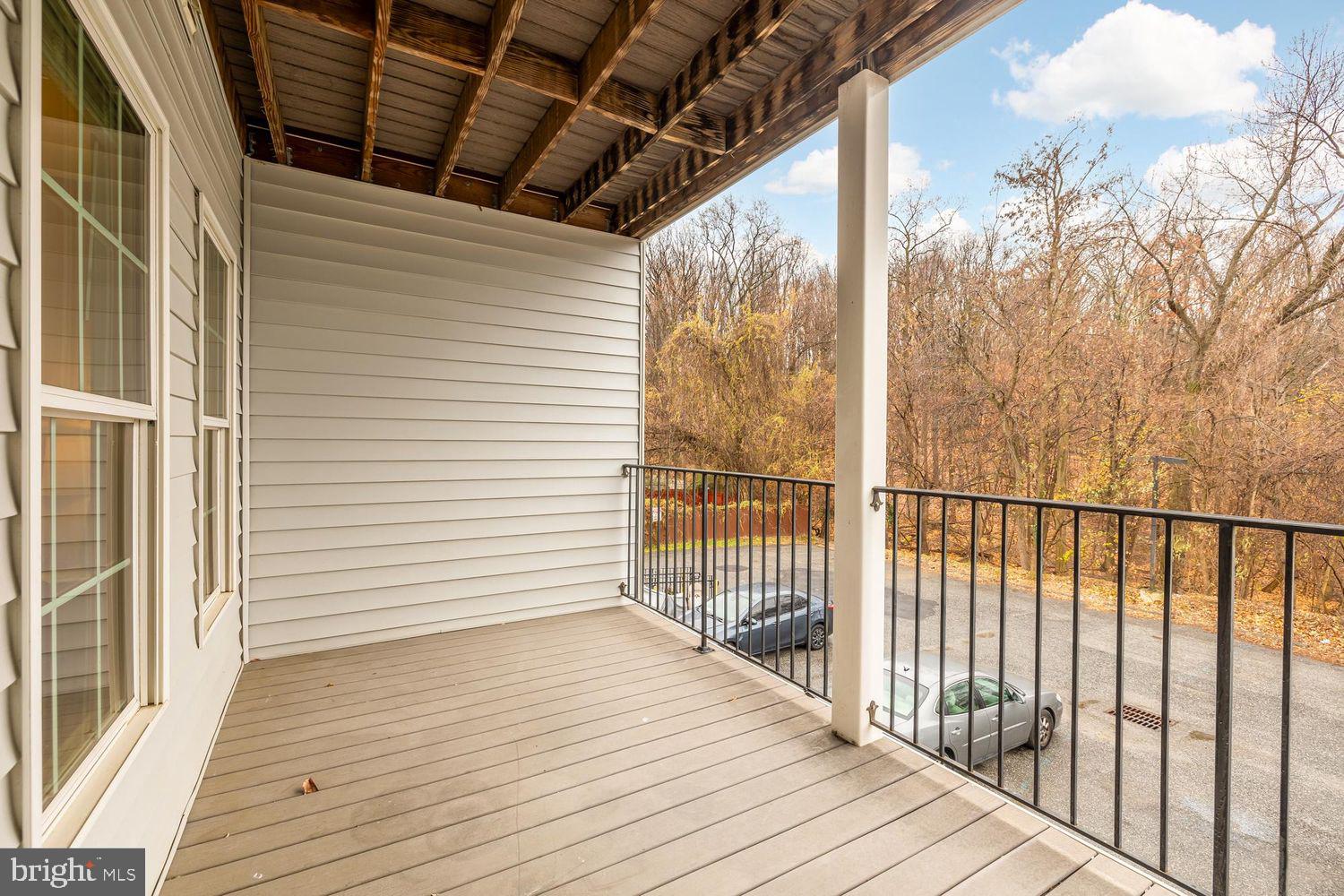 1753 W Street Southeast, Unit B Washington, DC 20020 - Photo 18 of 29 a view of a balcony with wooden floor