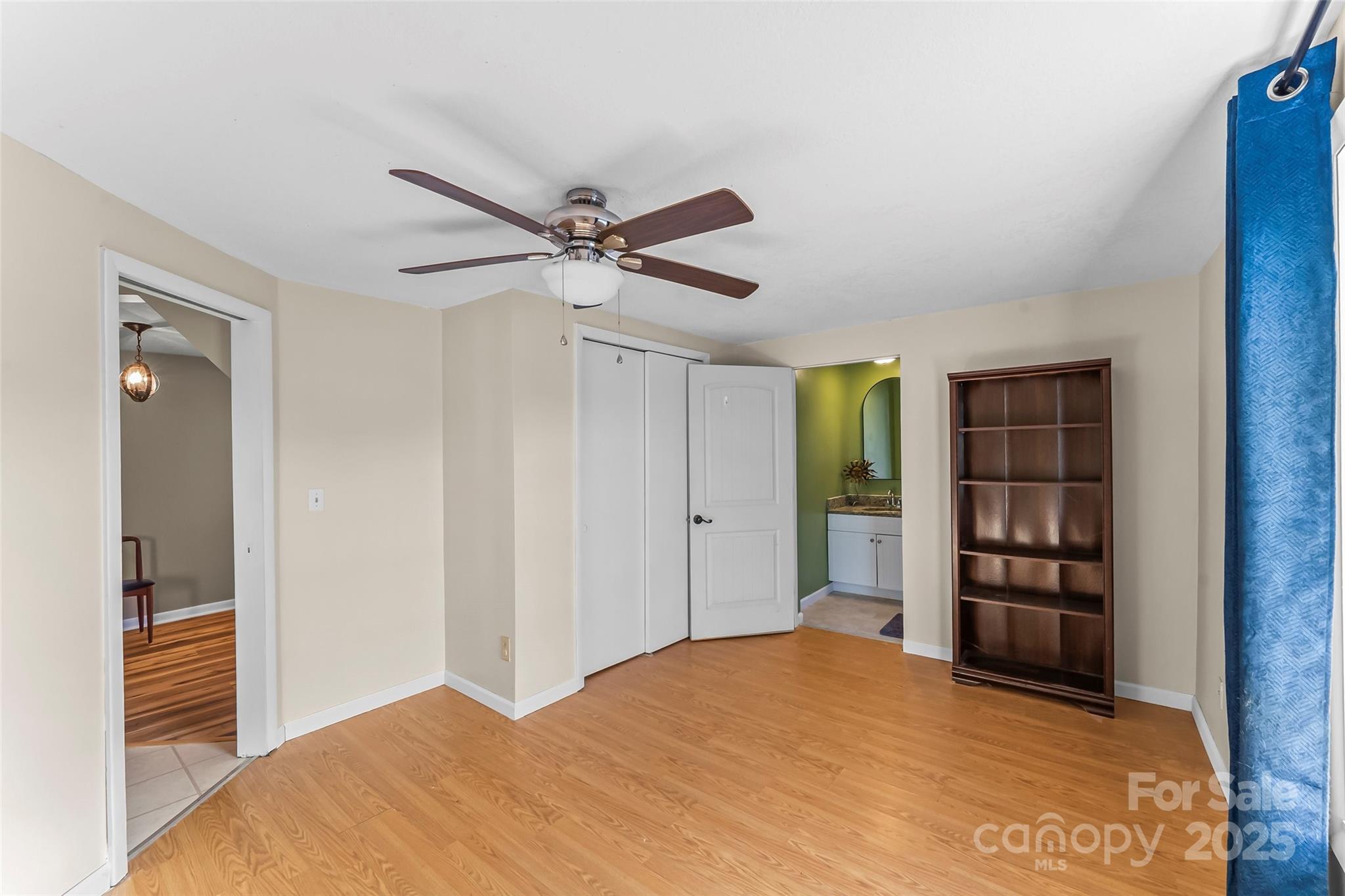 70 1st Street Canton, NC 28716 - Photo 16 of 34 a bedroom with a bed and a window
