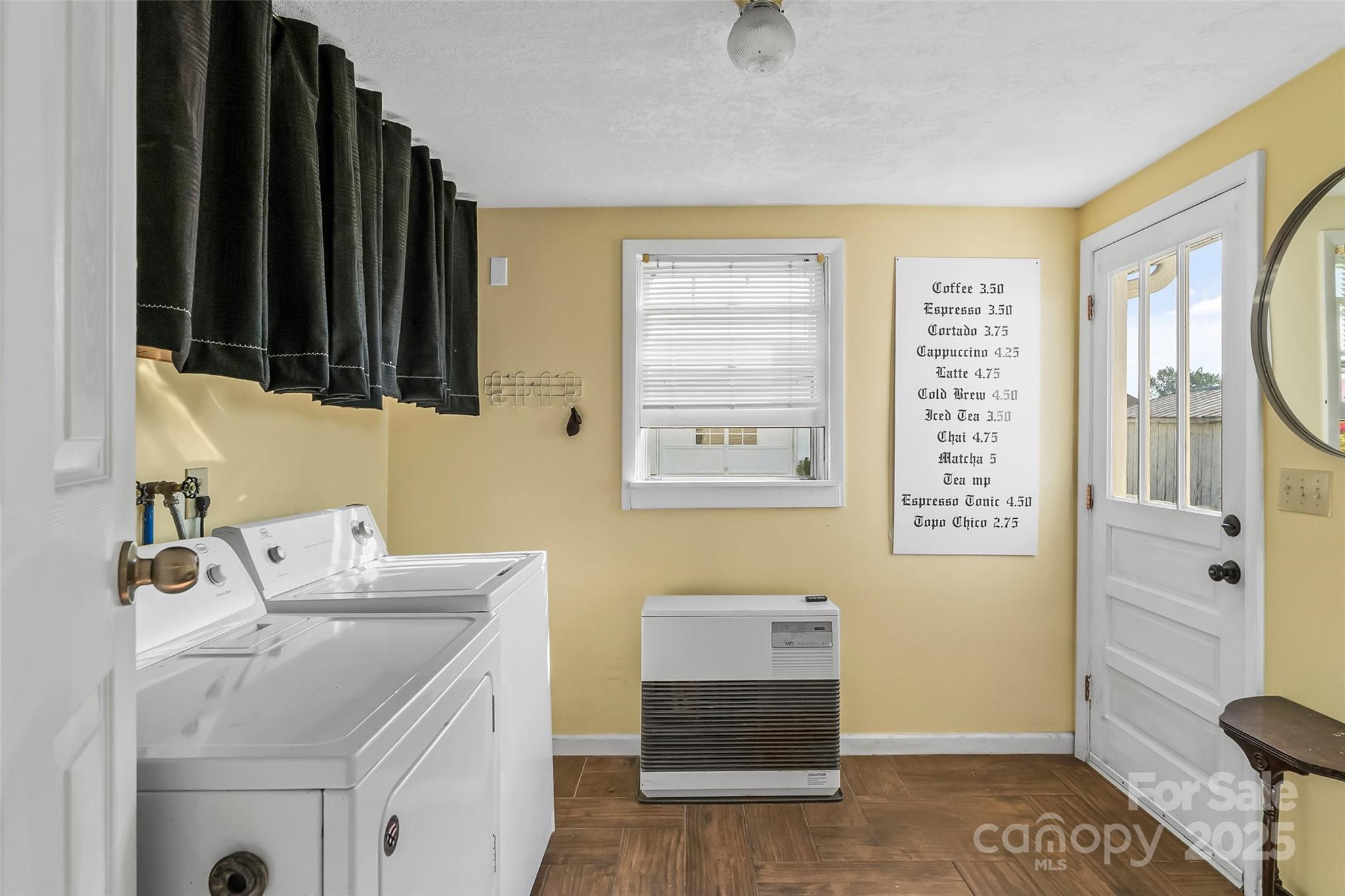 70 1st Street Canton, NC 28716 - Photo 20 of 34 a bathroom with a sink a toilet and a window