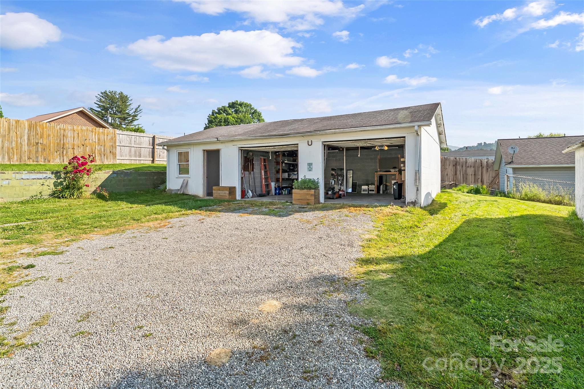 70 1st Street Canton, NC 28716 - Photo 22 of 34 a view of a house with swimming pool and porch