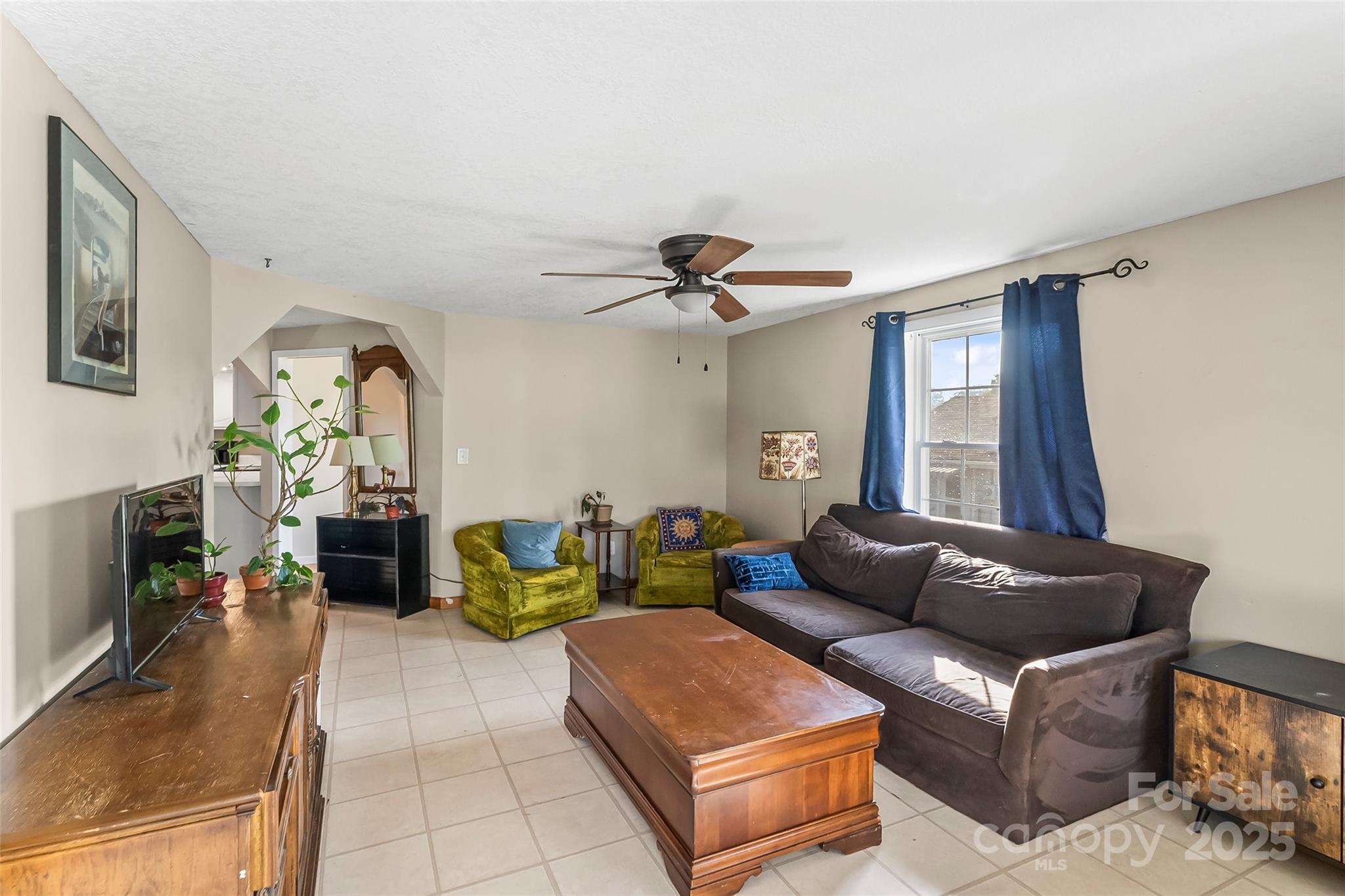 70 1st Street Canton, NC 28716 - Photo 8 of 34 a living room with furniture and a window