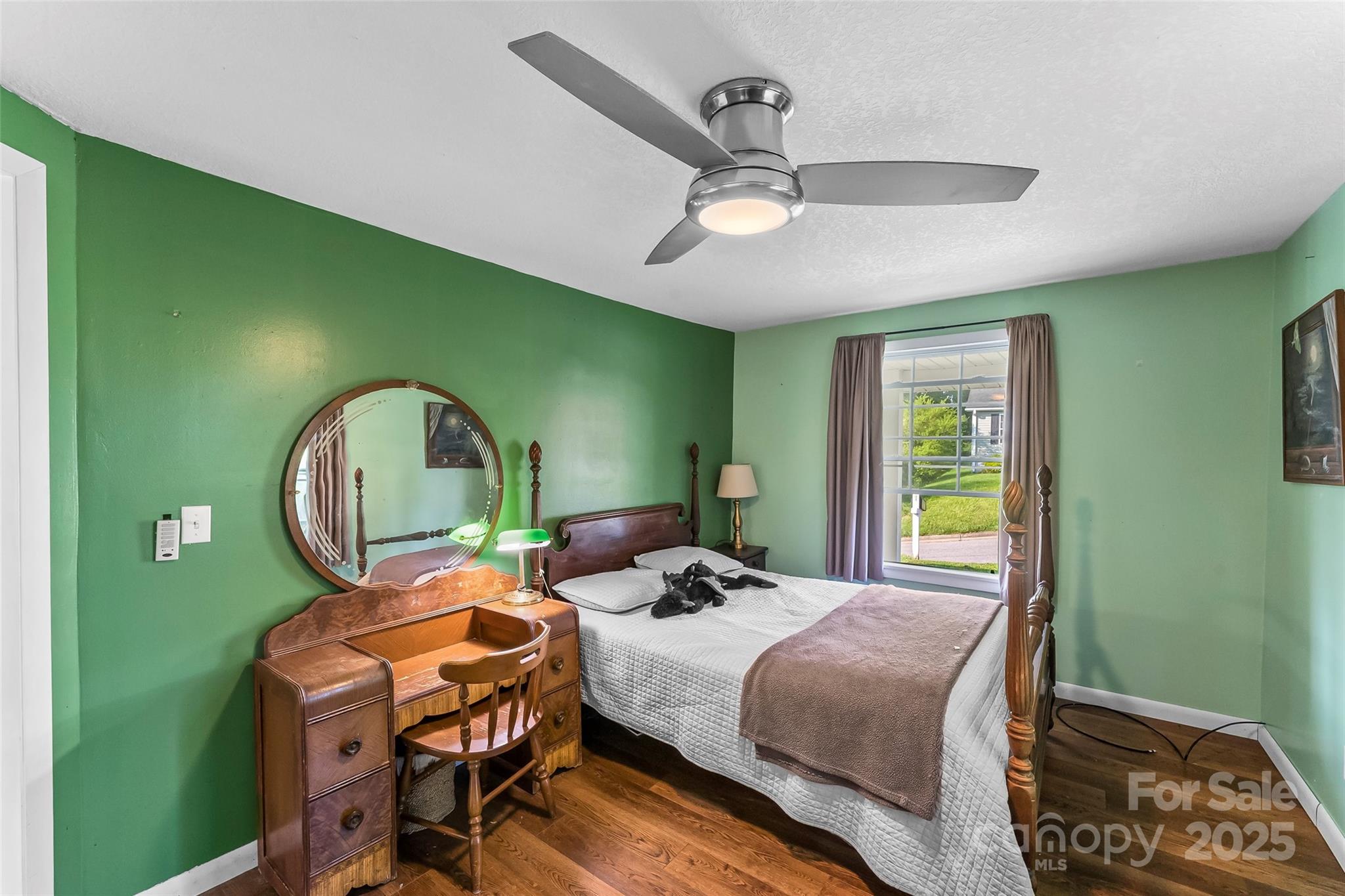 70 1st Street Canton, NC 28716 - Photo 10 of 34 a bedroom with a bed window and a mirror