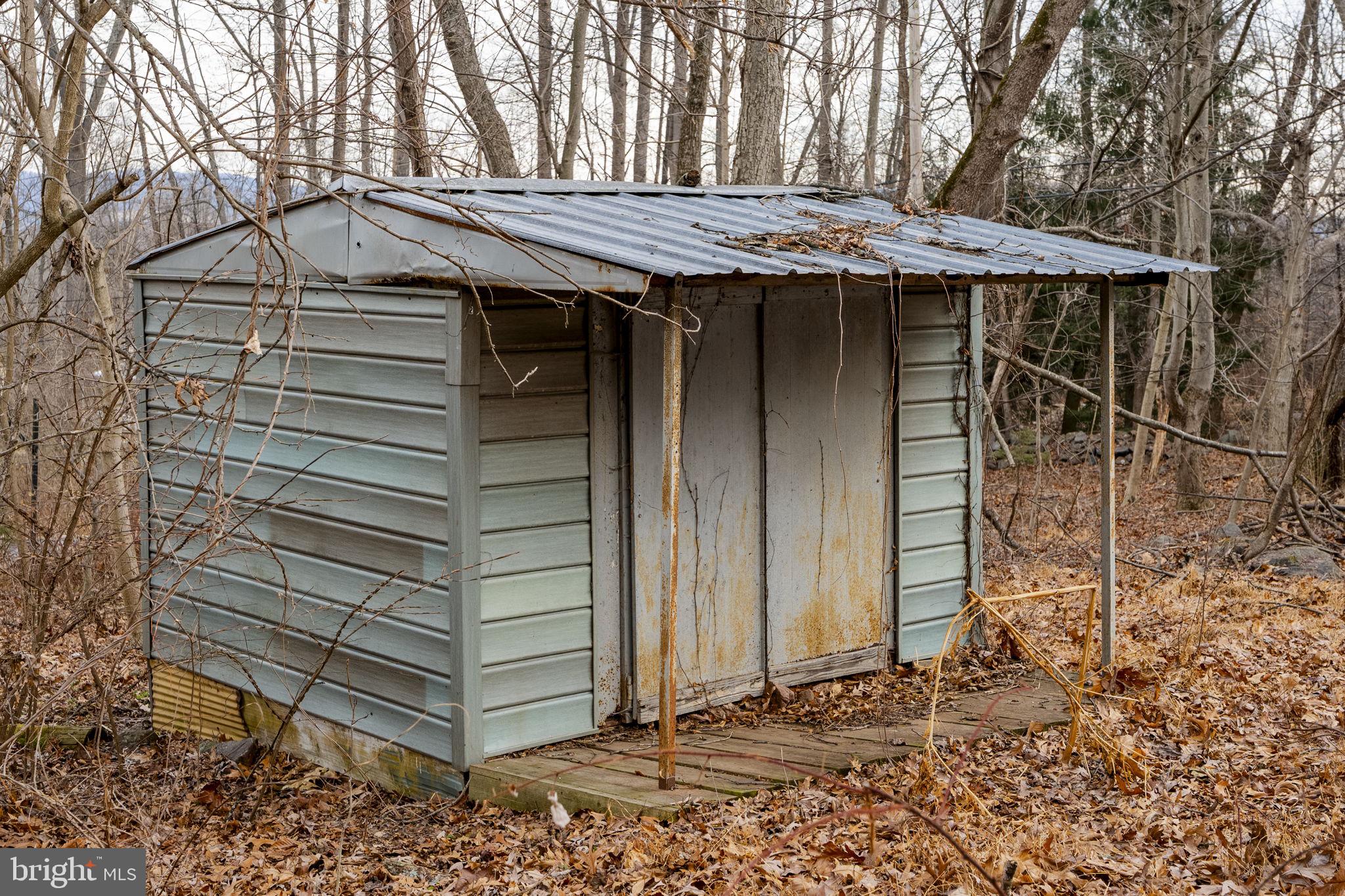 105 Wollups Hill Road Denver, PA 17517 - Photo 14 of 14 a yellow house with a outdoor space