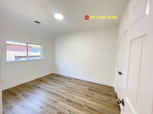 a bathroom with a tub sink mirror and a shower