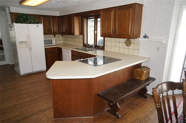31 Robert Road Stow, MA 01775 - Photo 2 of 11 a dining room with furniture and a window