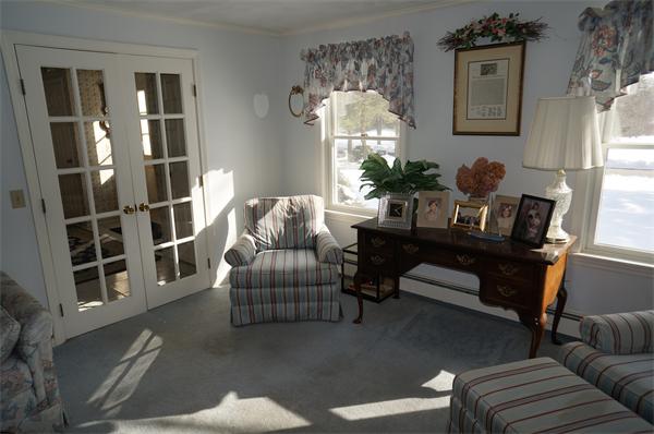 31 Robert Road Stow, MA 01775 - Photo 9 of 11 a living room with furniture and a window