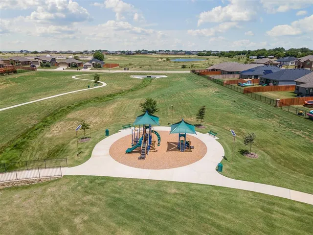 a view of a lake with a yard