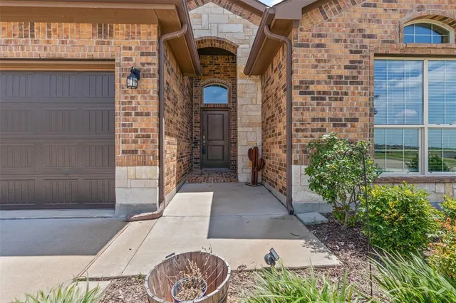 a view of entrance gate of a house