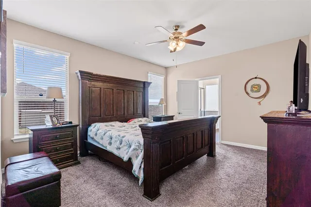a view of a dining room with furniture windows and wooden floor