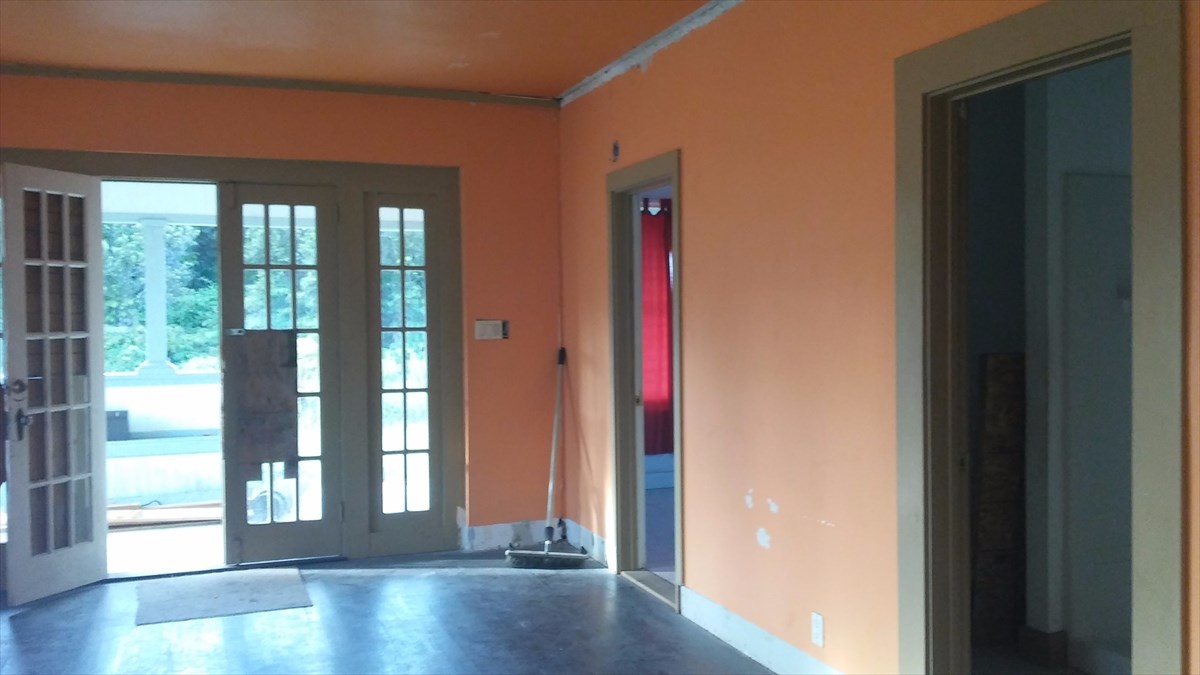 11-3379 Old Volcano Road Volcano, HI 96778 - Photo 3 of 4 a view of an entryway with wooden floor and windows
