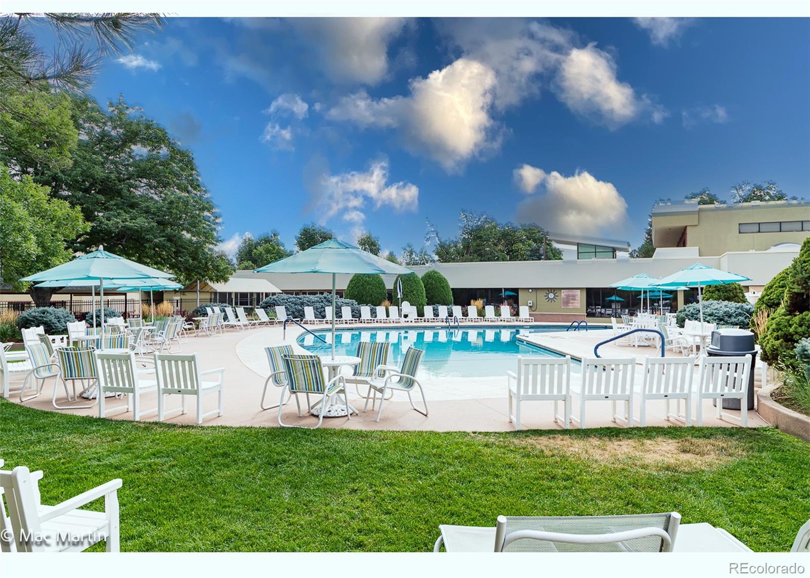 710 South Clinton Street, Unit 6B Denver, CO 80247 - Photo 26 of 31 a view of a house with a yard