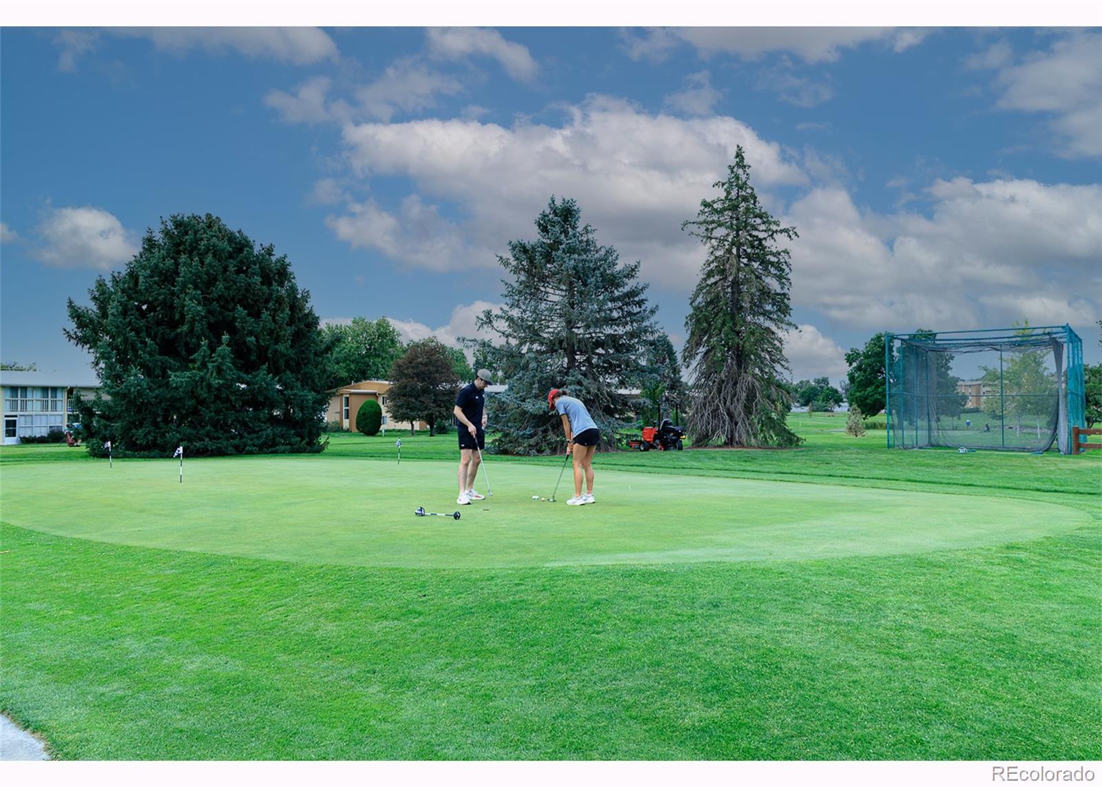 710 South Clinton Street, Unit 6B Denver, CO 80247 - Photo 27 of 31 a view of a park with large trees