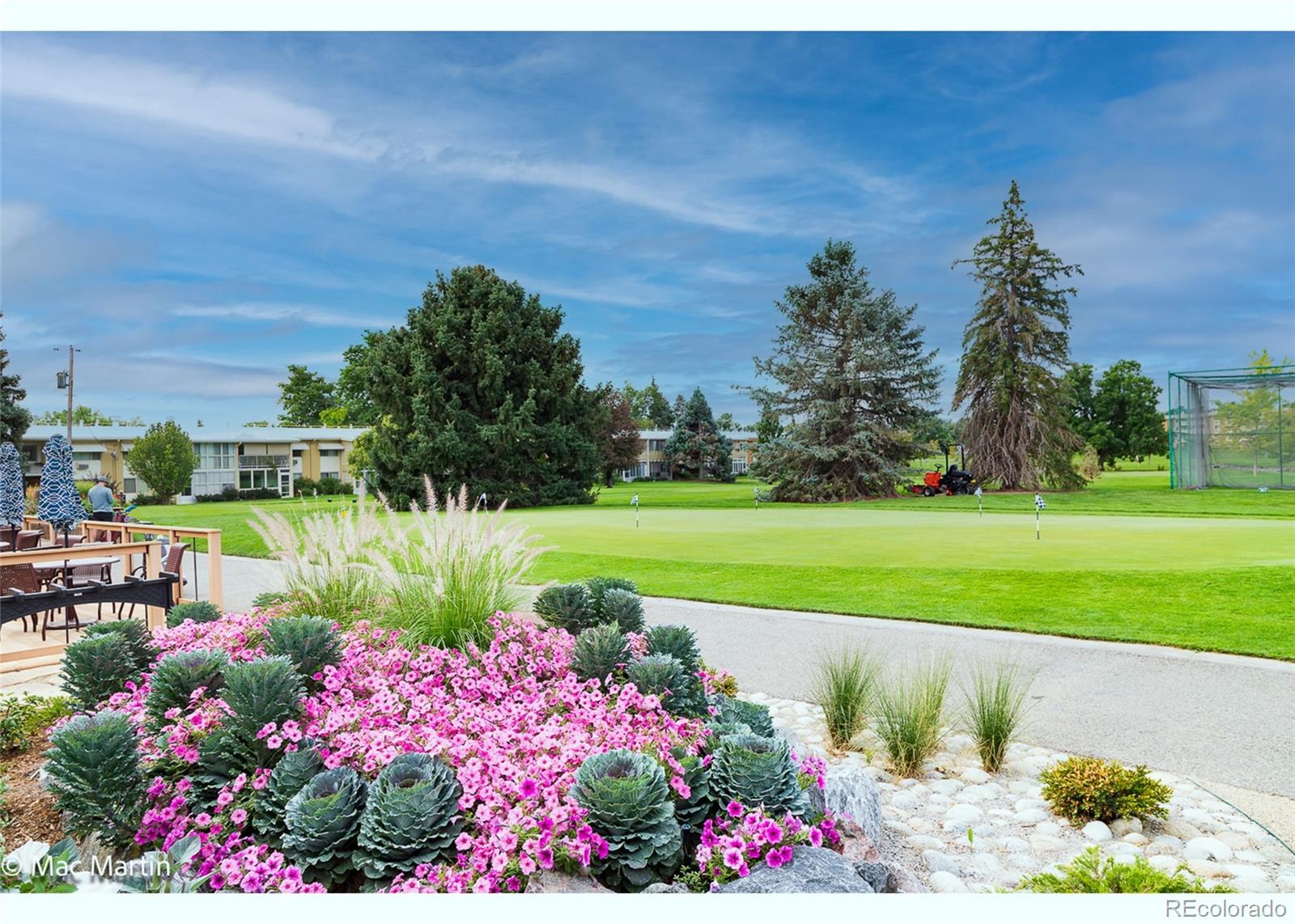 710 South Clinton Street, Unit 6B Denver, CO 80247 - Photo 28 of 31 a view of a lake with a garden