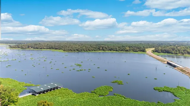 a view of a lake in middle of the town