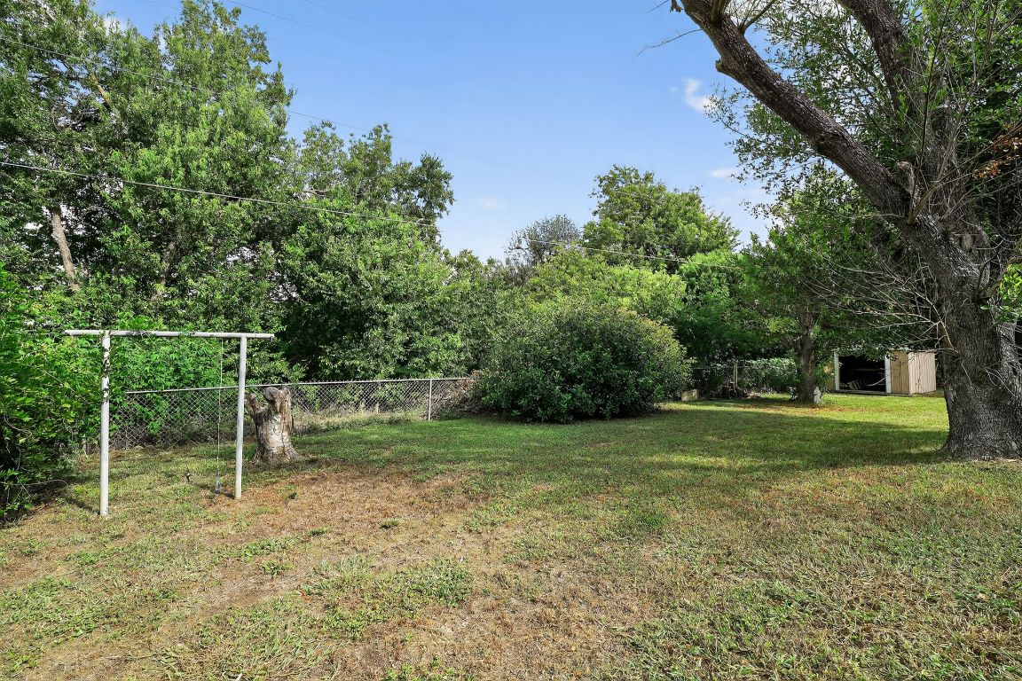 324 McClendon Drive Elgin, TX 78621 - Photo 14 of 16 a view of a house with a yard