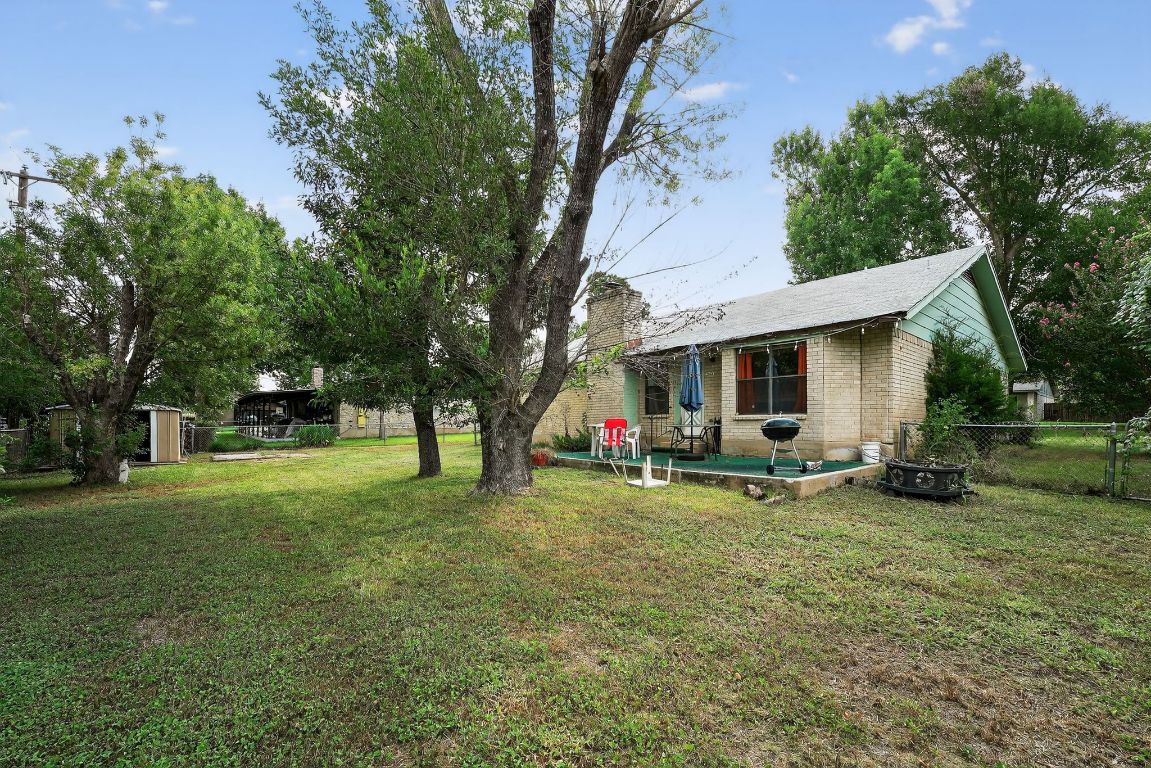 324 McClendon Drive Elgin, TX 78621 - Photo 15 of 16 a view of a house with backyard porch and sitting area