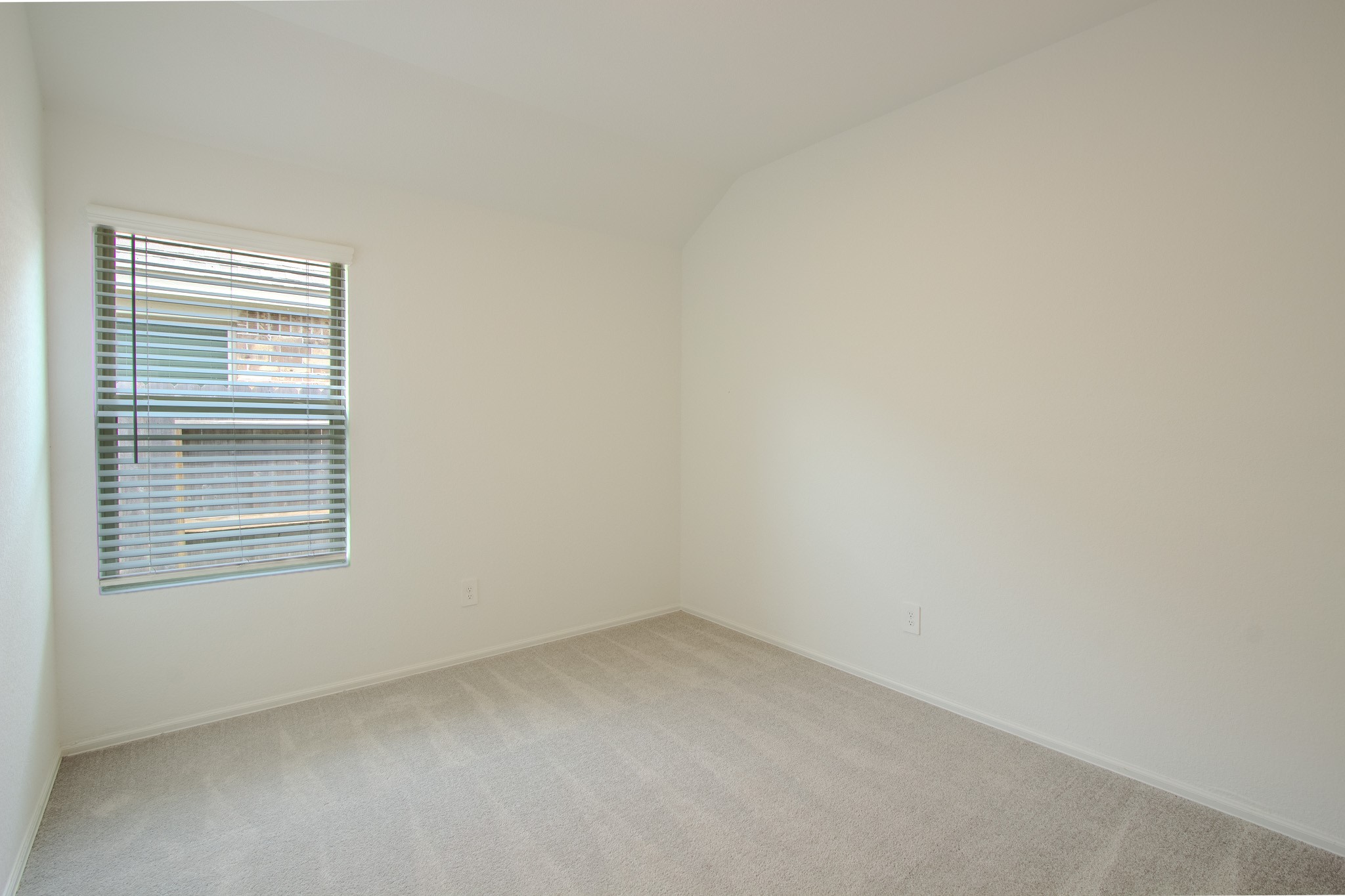 3113 Catalonion Court Conroe, TX 77301 - Photo 20 of 45 a view of an empty room with a window