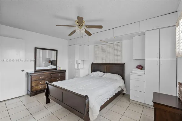 a kitchen with a stove and a refrigerator