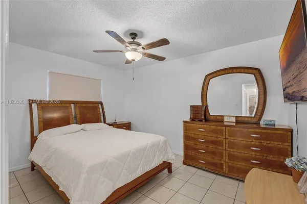 a bedroom with a bed and closet