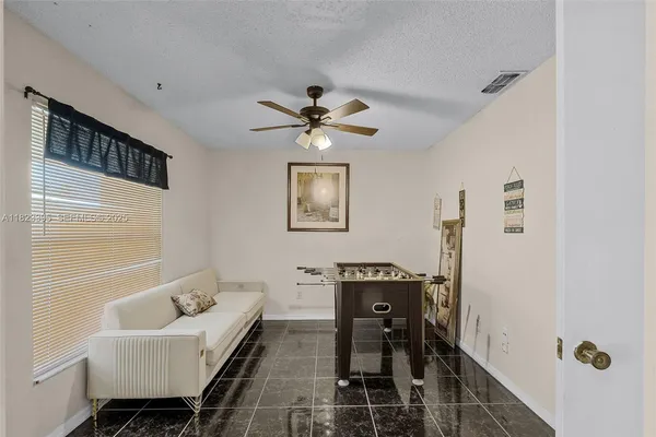 a workspace with furniture and a window