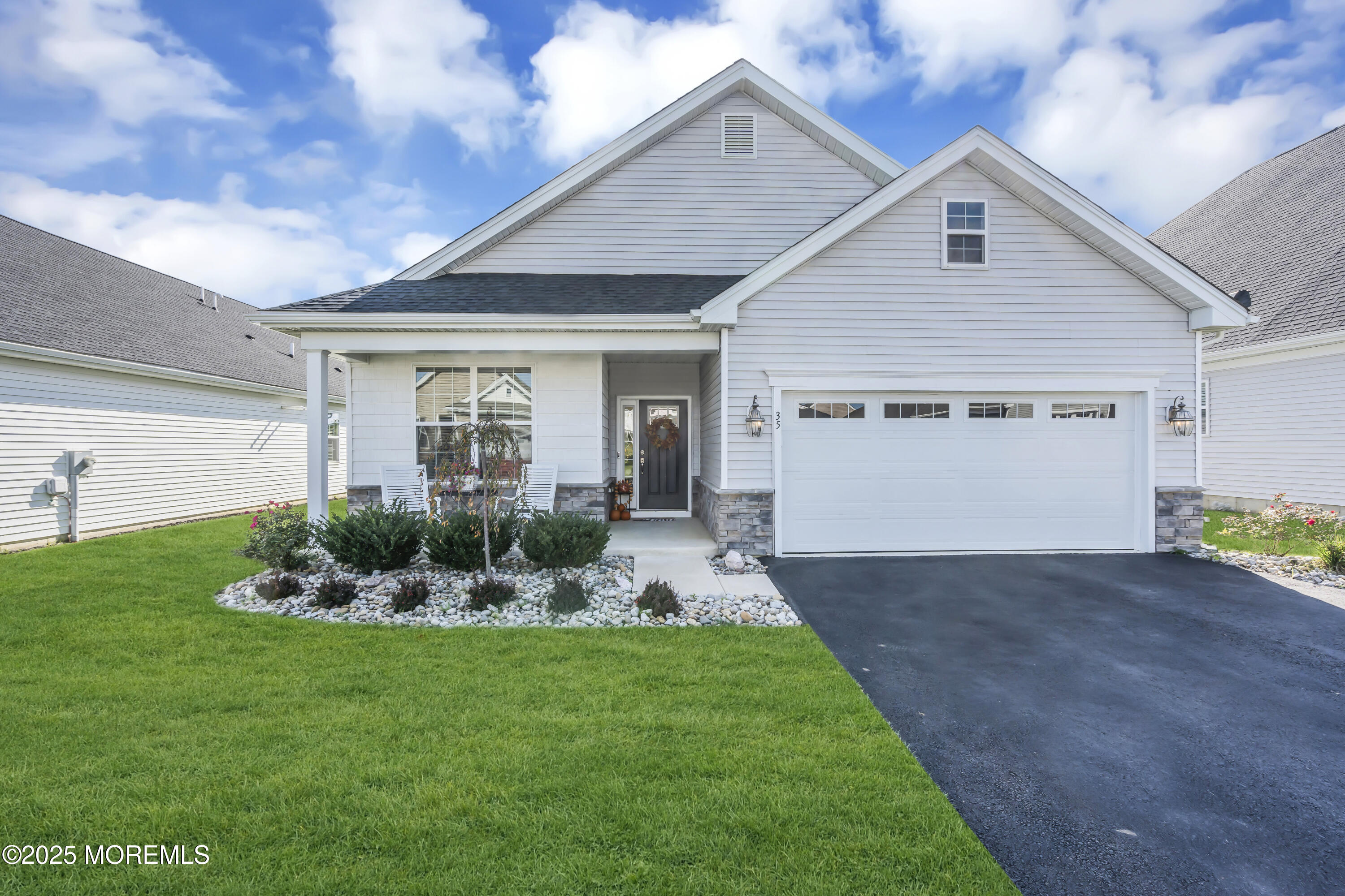 35 Saratoga Road New Egypt, NJ 08533 - Photo 1 of 41 a front view of a house with a garden
