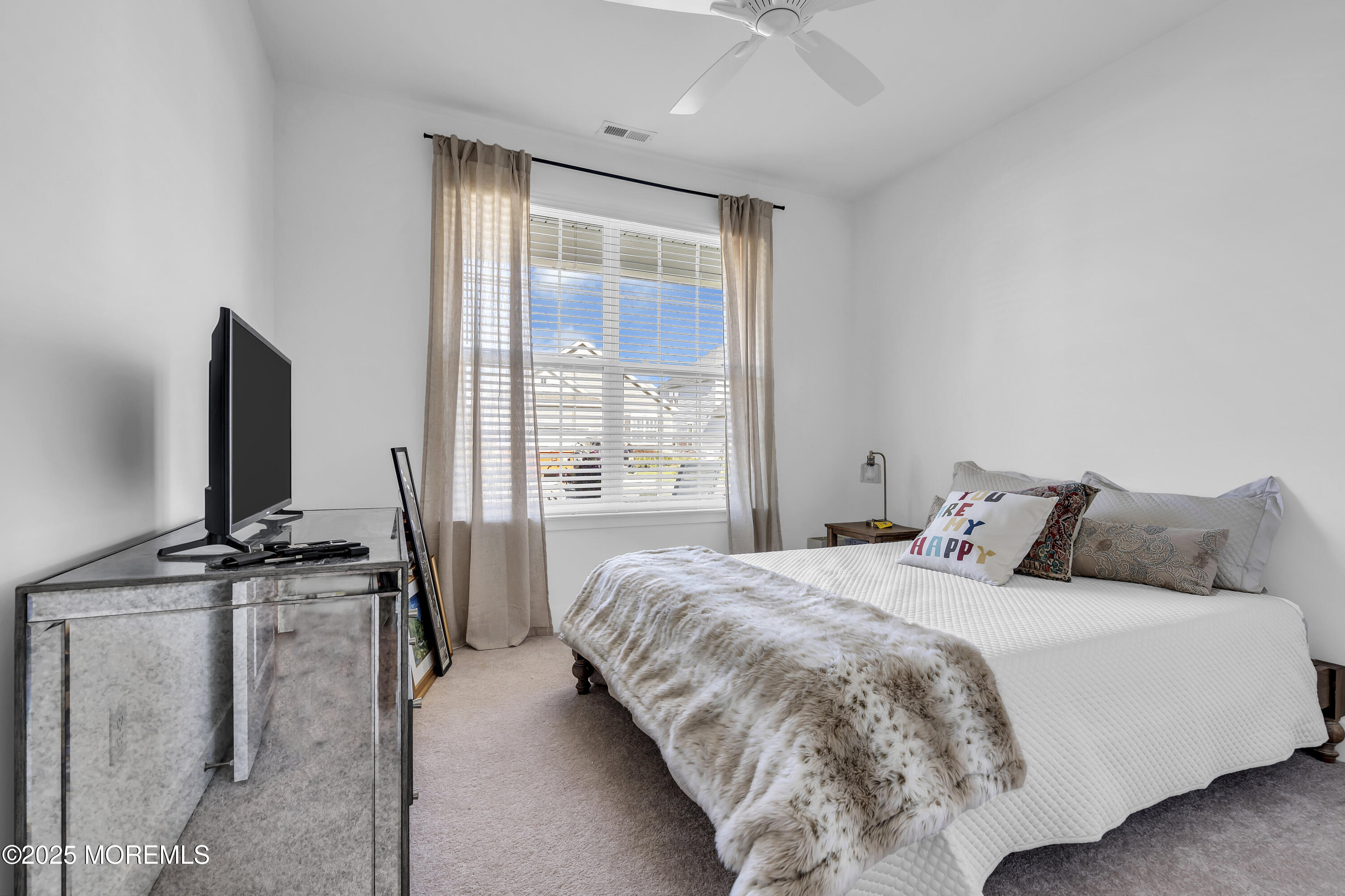 35 Saratoga Road New Egypt, NJ 08533 - Photo 17 of 41 a bedroom with a bed tv and window