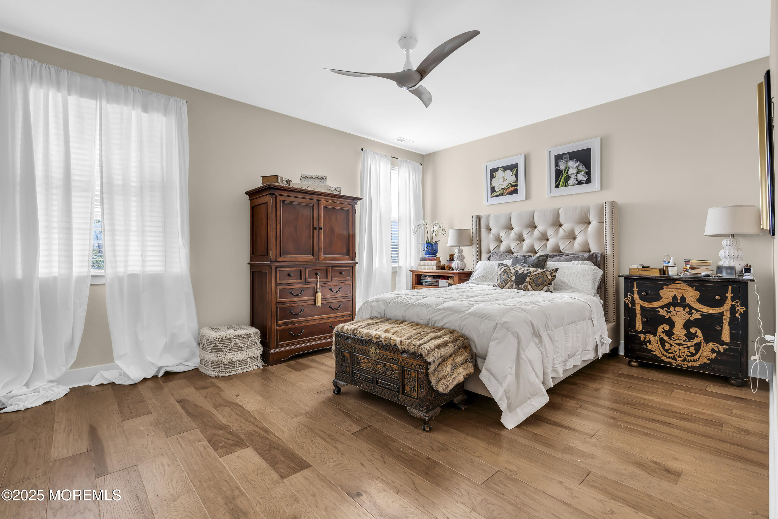 35 Saratoga Road New Egypt, NJ 08533 - Photo 24 of 41 a spacious bedroom with a bed and a ceiling fan
