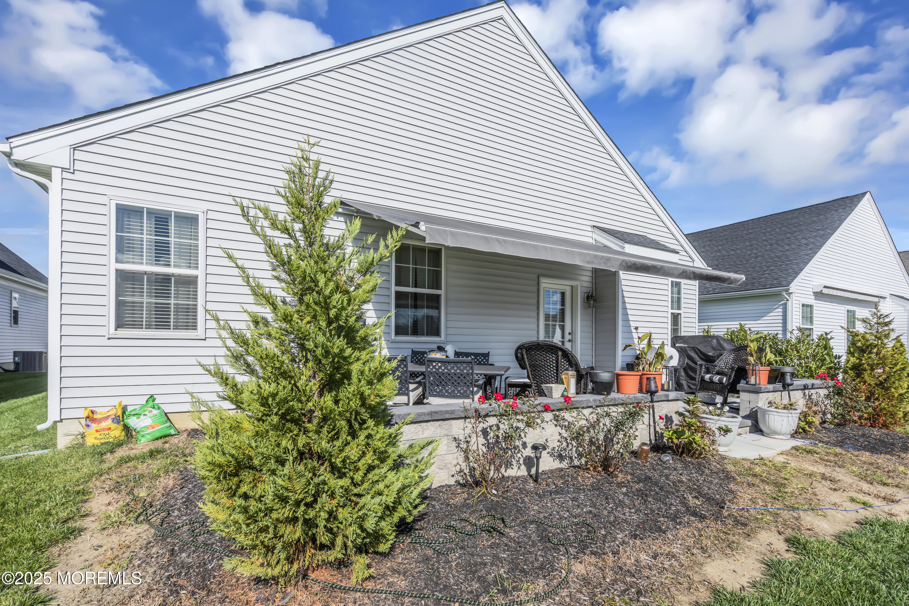 35 Saratoga Road New Egypt, NJ 08533 - Photo 34 of 41 a view of a house with sitting area and garden