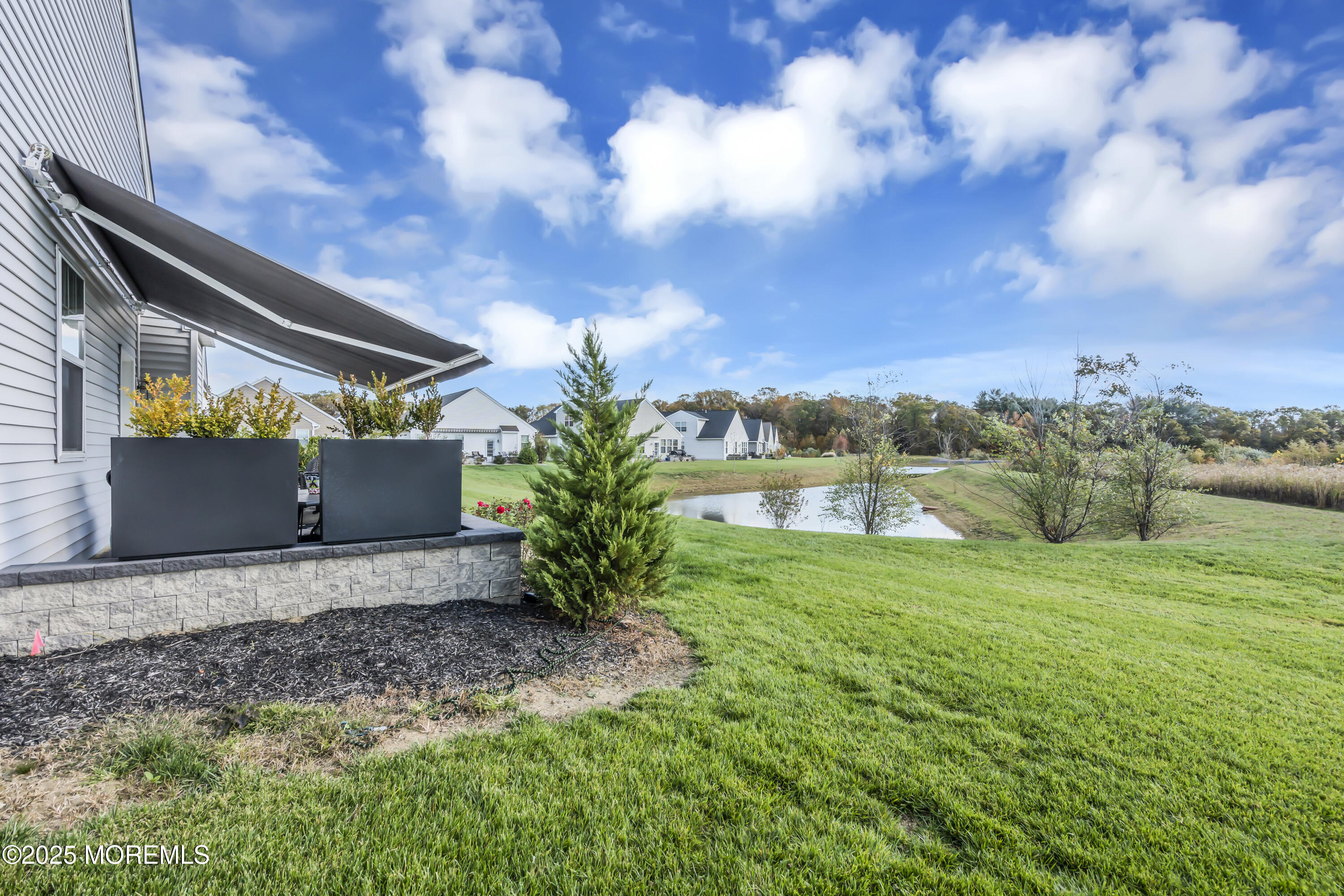 35 Saratoga Road New Egypt, NJ 08533 - Photo 35 of 41 a backyard of a house with lots of green space
