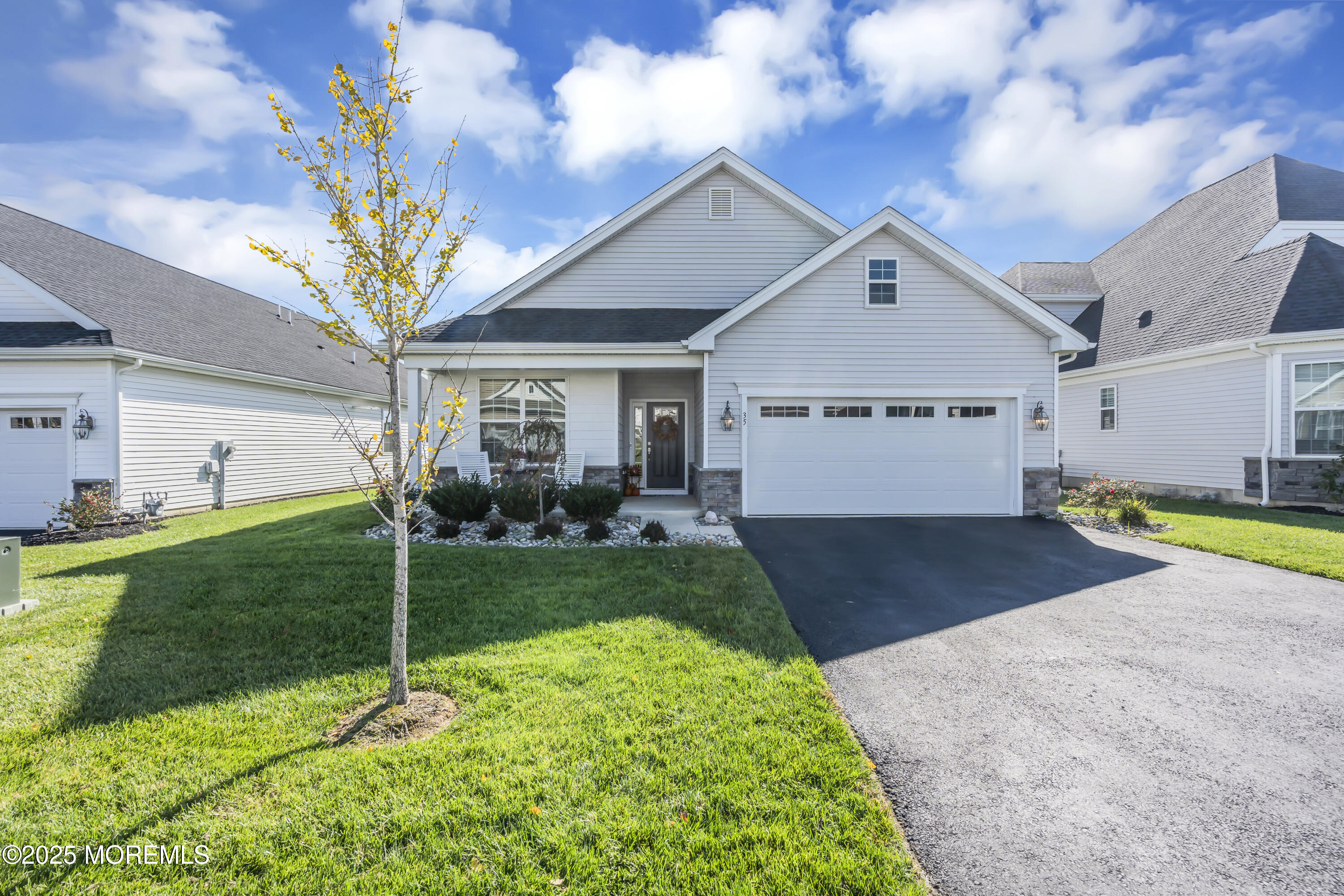 35 Saratoga Road New Egypt, NJ 08533 - Photo 40 of 41 a front view of a house with garden