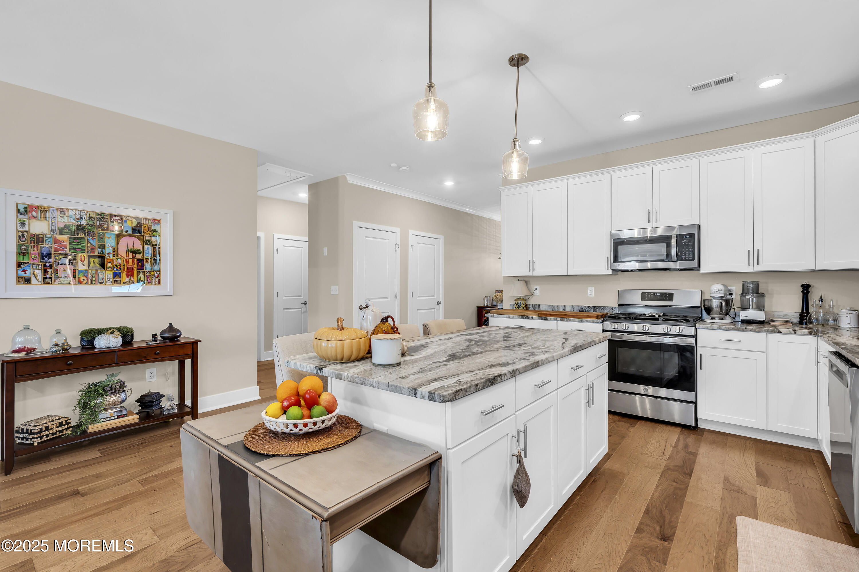 35 Saratoga Road New Egypt, NJ 08533 - Photo 10 of 41 a kitchen with a stove a sink and a refrigerator