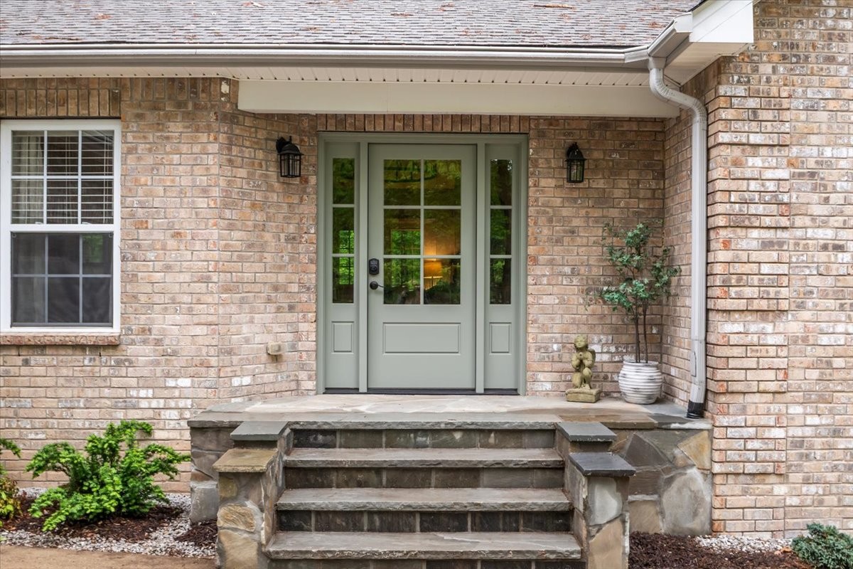 7327 Hunting Camp Road Fairview, TN 37062 - Photo 6 of 83 a front view of a house with a window