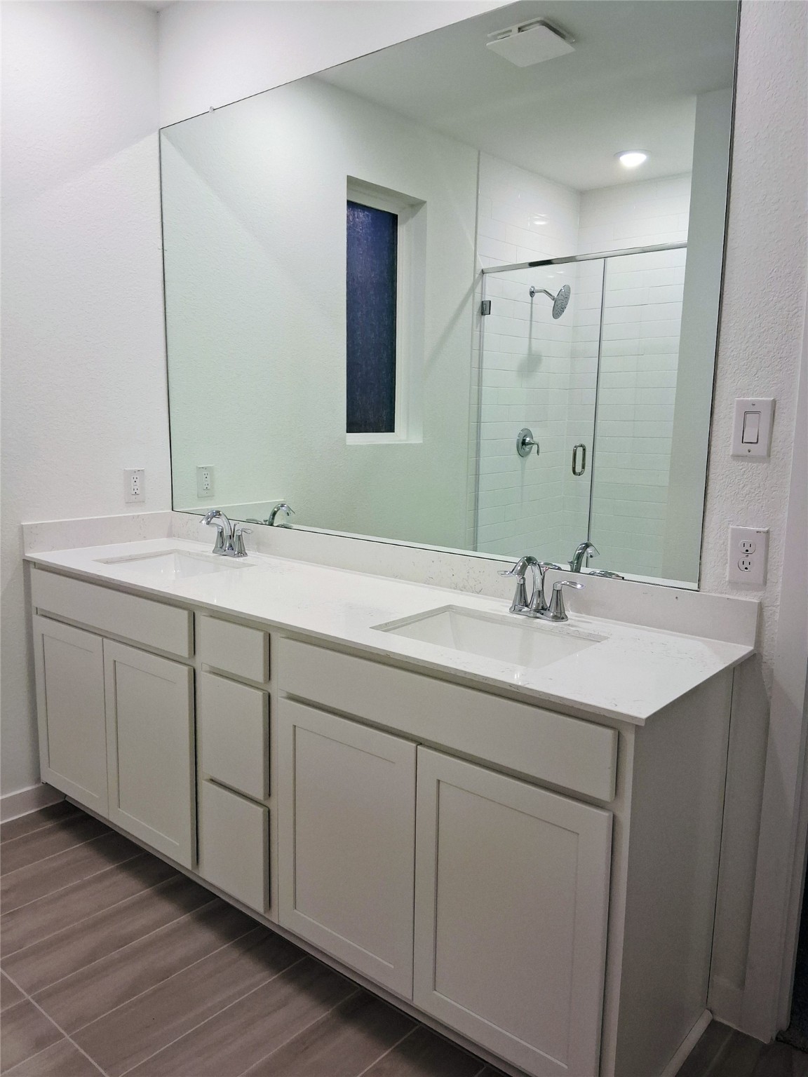 1047 Blue Stone Drive Beasley, TX 77417 - Photo 7 of 11 a bathroom with a double vanity sink and mirror
