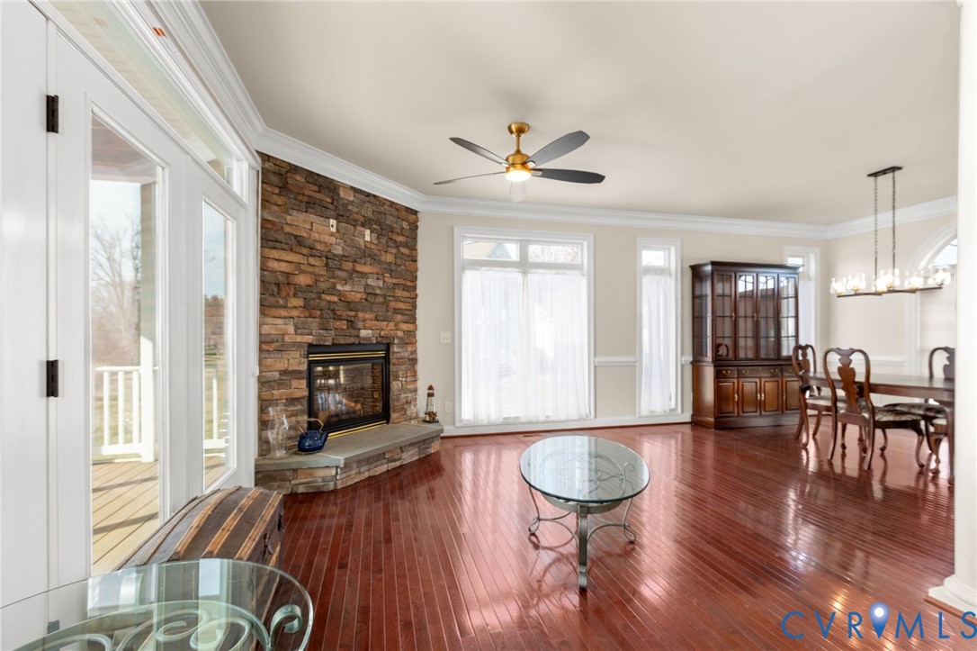 175 Shellfield Lane Colonial Beach, VA 22443 - Photo 13 of 100 Living room with ornamental molding, dark wood fin