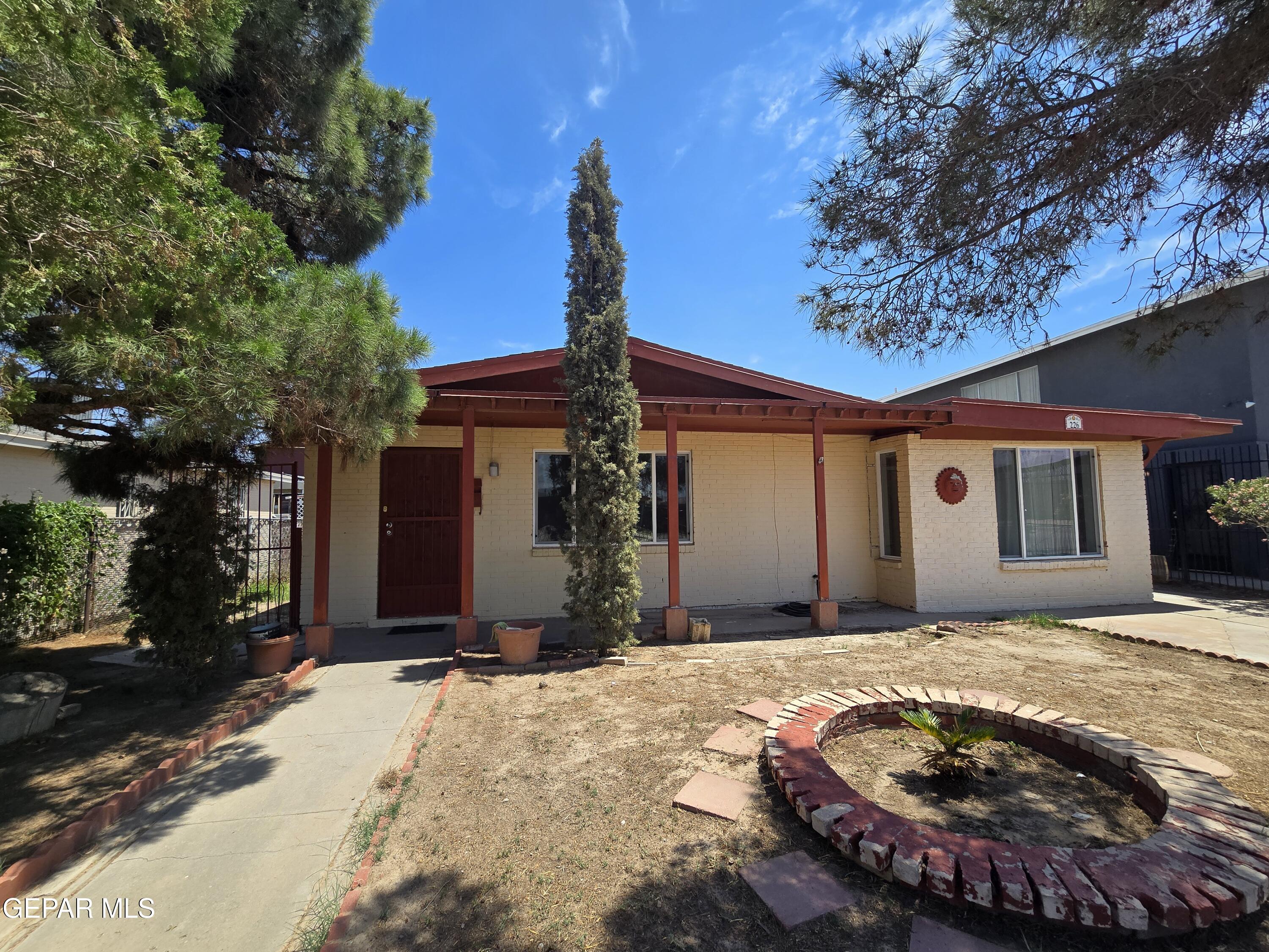 a view of a house with snow in the backyard