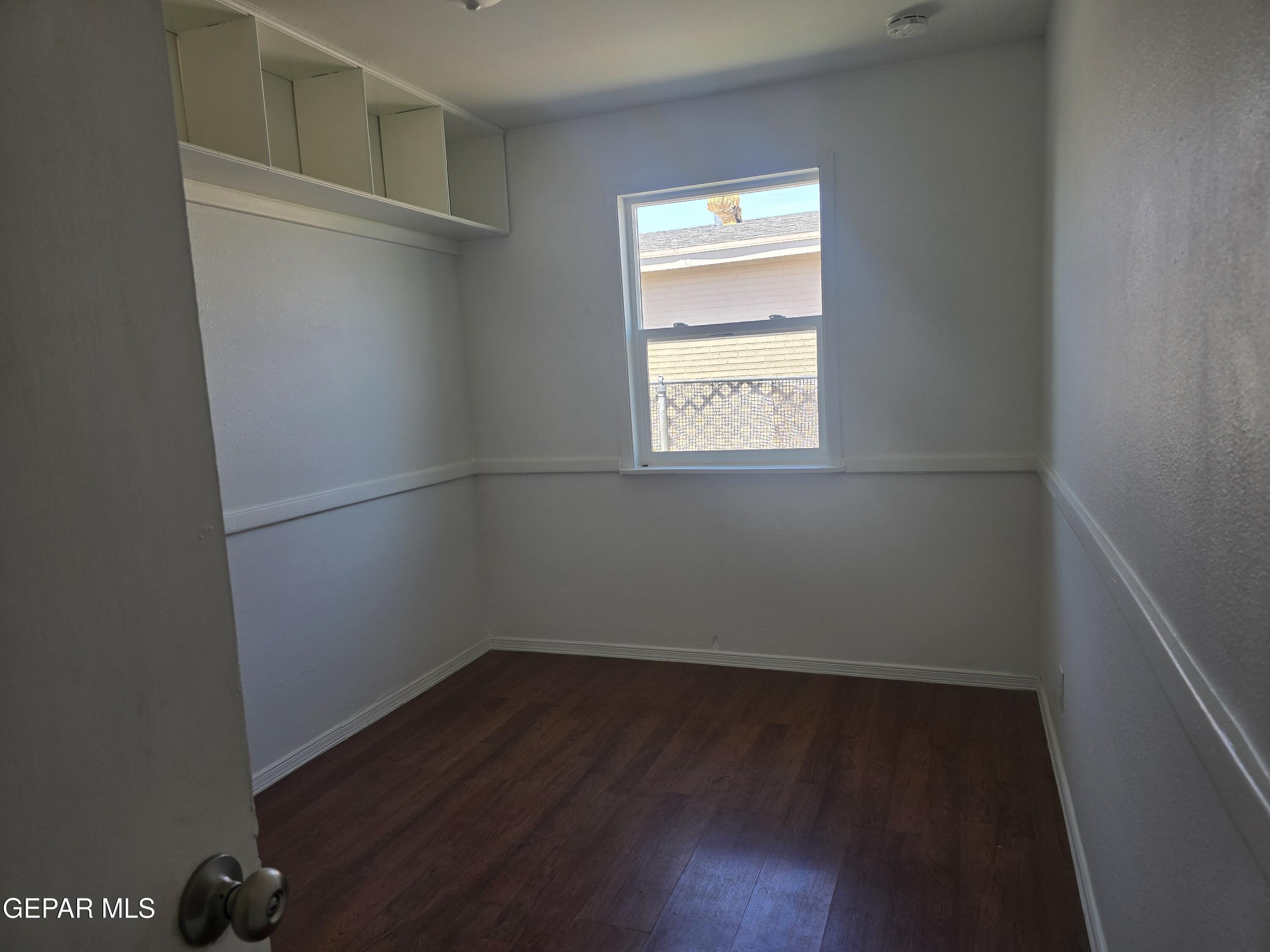 226 Coronado Road El Paso, TX 79915 - Photo 17 of 22 an empty room with a window