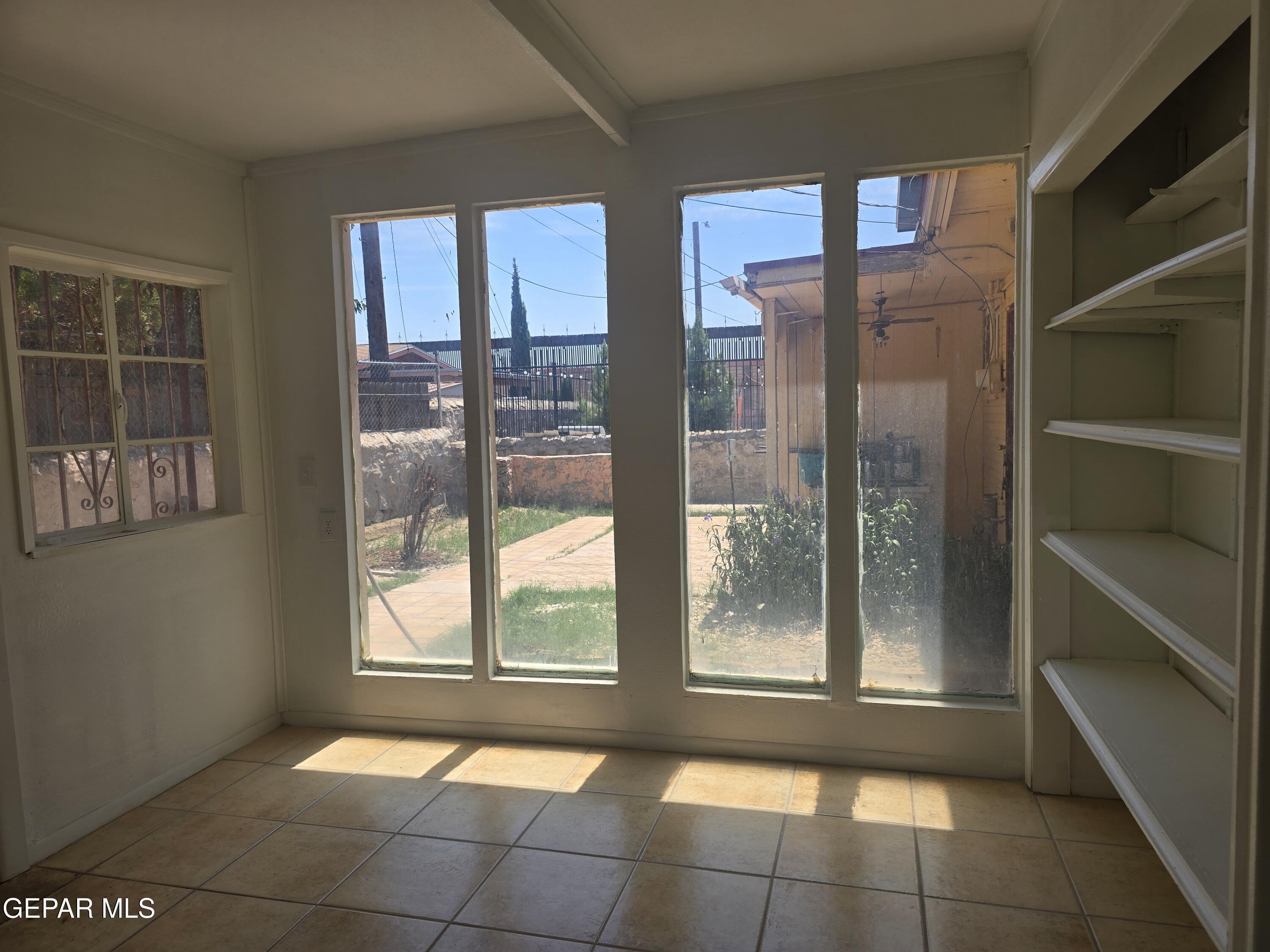 226 Coronado Road El Paso, TX 79915 - Photo 20 of 22 a view of an empty room with a window
