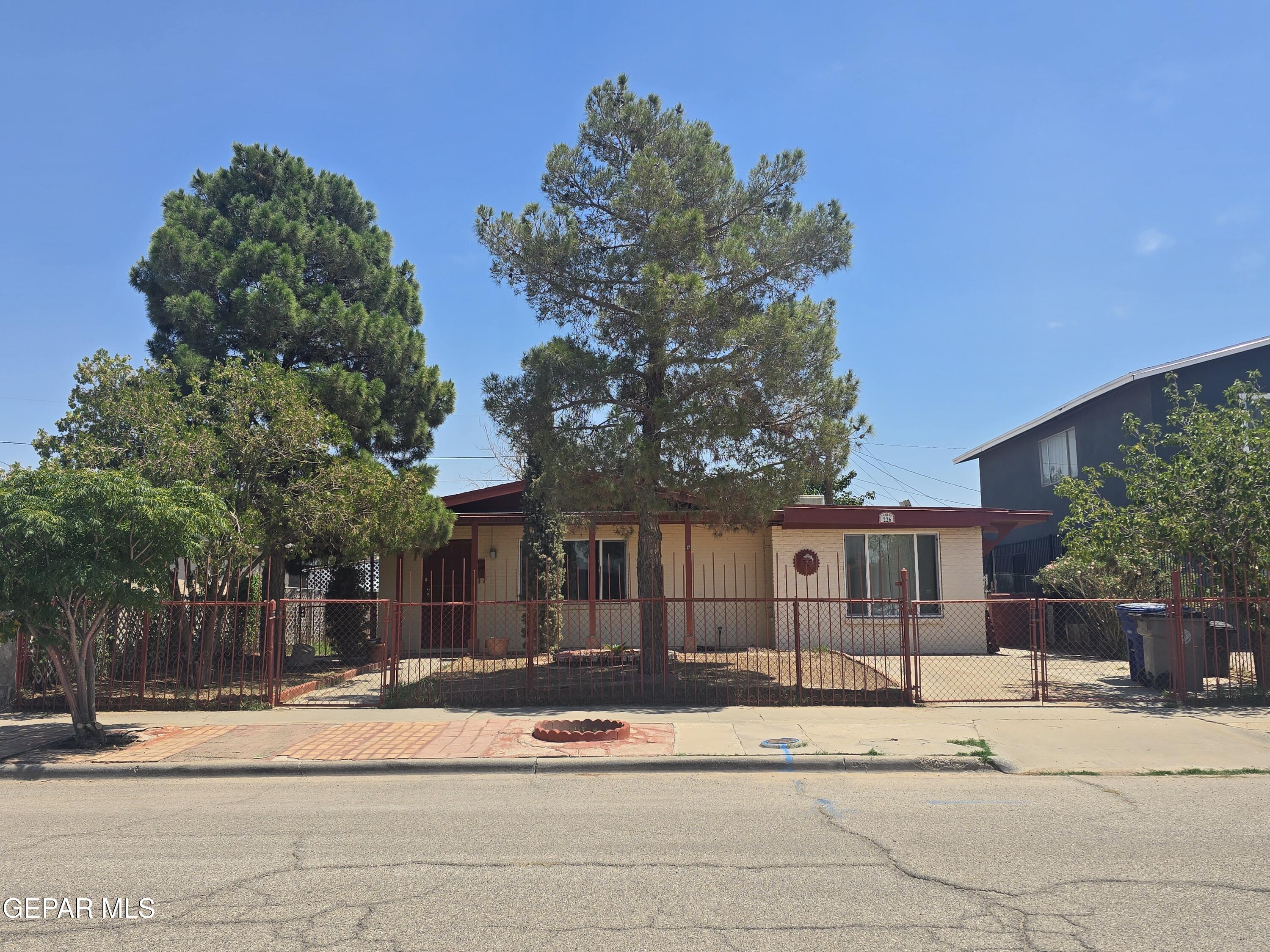226 Coronado Road El Paso, TX 79915 - Photo 3 of 22 a front view of a house with a yard