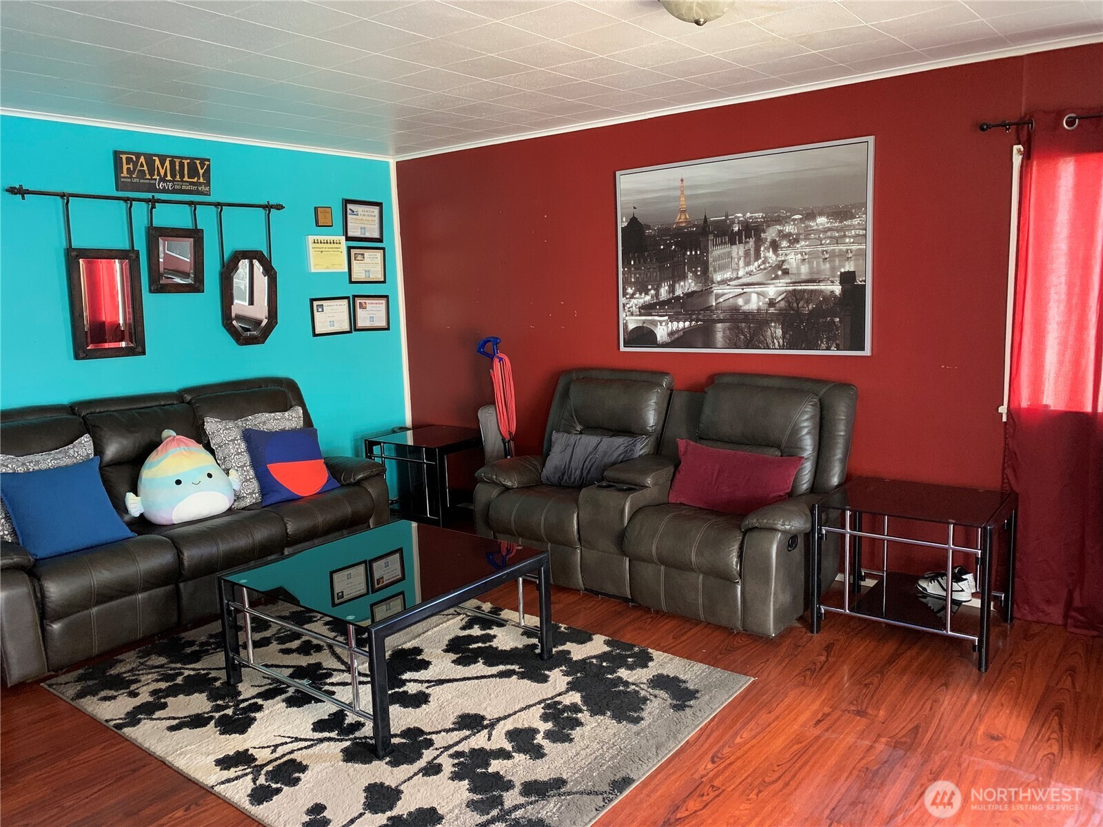 632 Index Avenue Northeast Renton, WA 98056 - Photo 3 of 13 a living room with furniture and a wooden floor