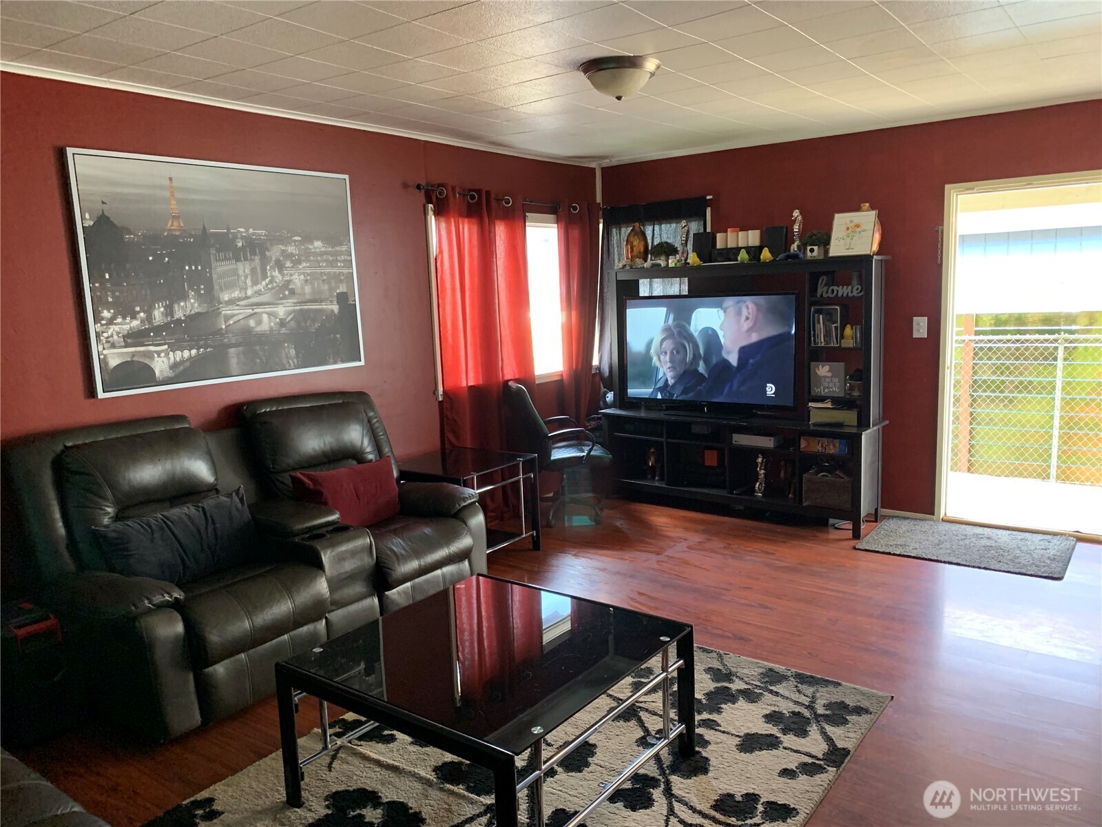 632 Index Avenue Northeast Renton, WA 98056 - Photo 5 of 13 a living room with furniture and a flat screen tv